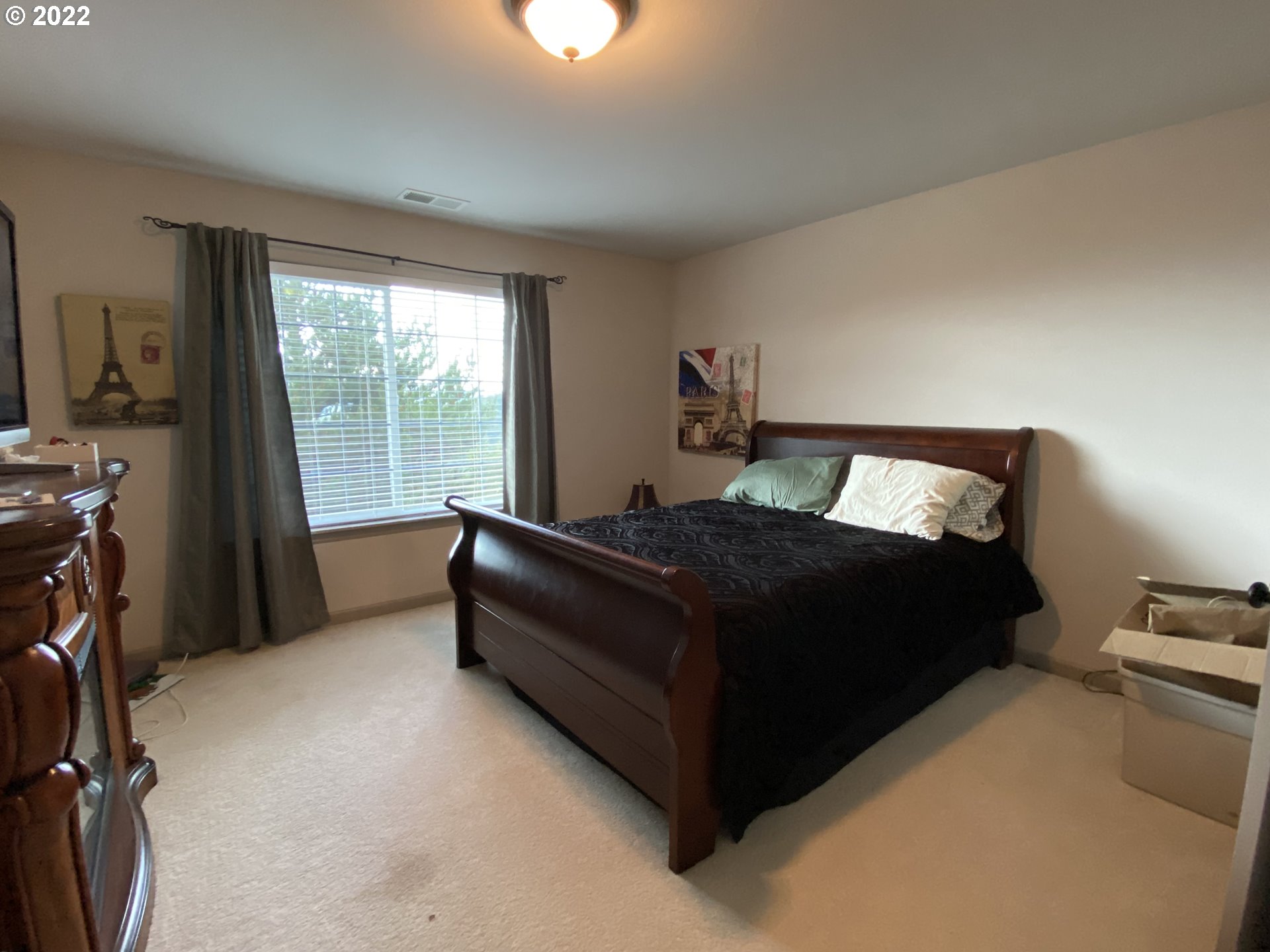 1548 Northeast Rocky Ridge Drive Roseburg, OR 97470 - Photo 24 of 31 a bedroom with a bed and a balcony view