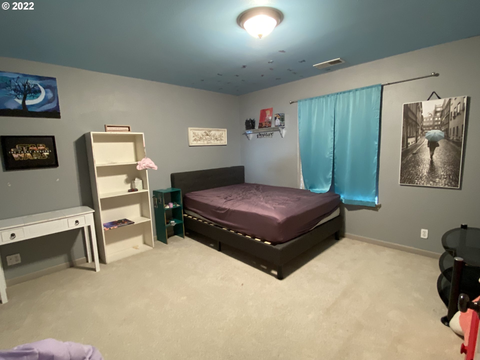1548 Northeast Rocky Ridge Drive Roseburg, OR 97470 - Photo 25 of 31 a bedroom with a bed and a desk