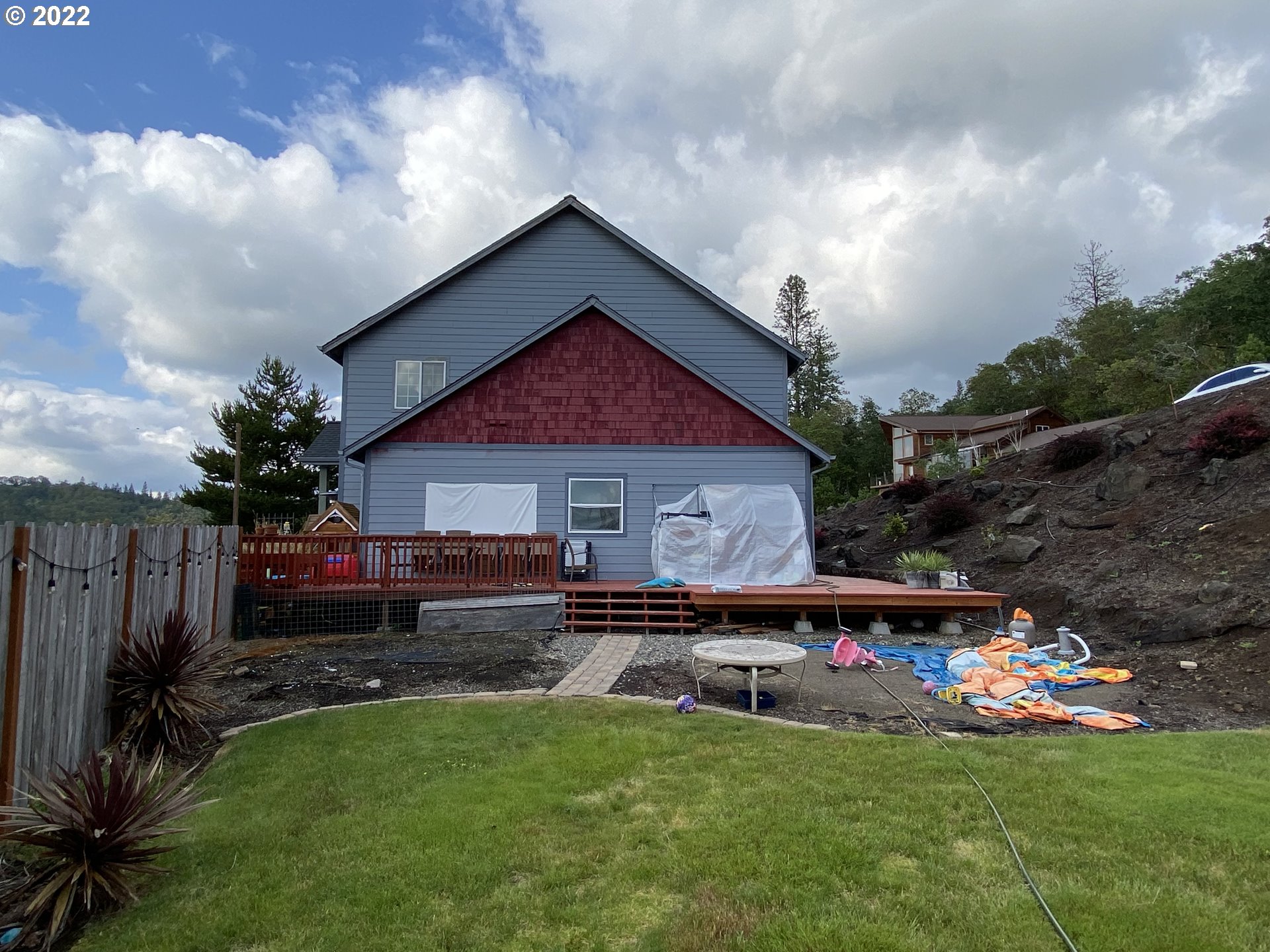 1548 Northeast Rocky Ridge Drive Roseburg, OR 97470 - Photo 6 of 31 a front view of house with yard and green space