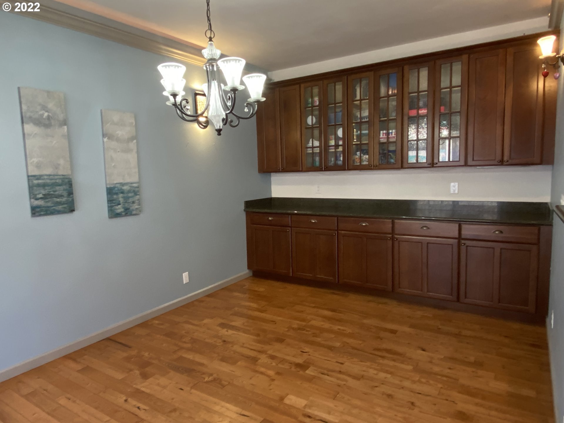 1548 Northeast Rocky Ridge Drive Roseburg, OR 97470 - Photo 9 of 31 a view of kitchen with wooden floor and windows