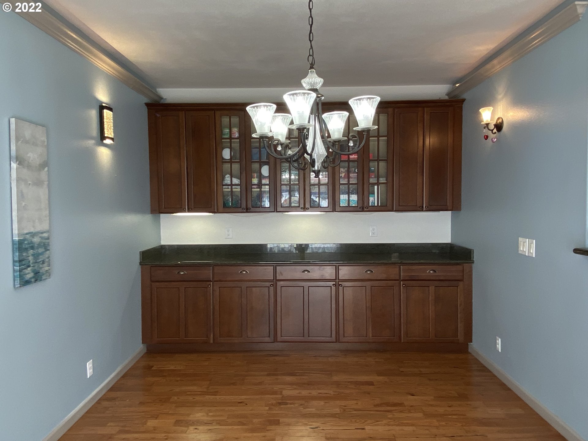 1548 Northeast Rocky Ridge Drive Roseburg, OR 97470 - Photo 10 of 31 a kitchen with a sink and chandelier