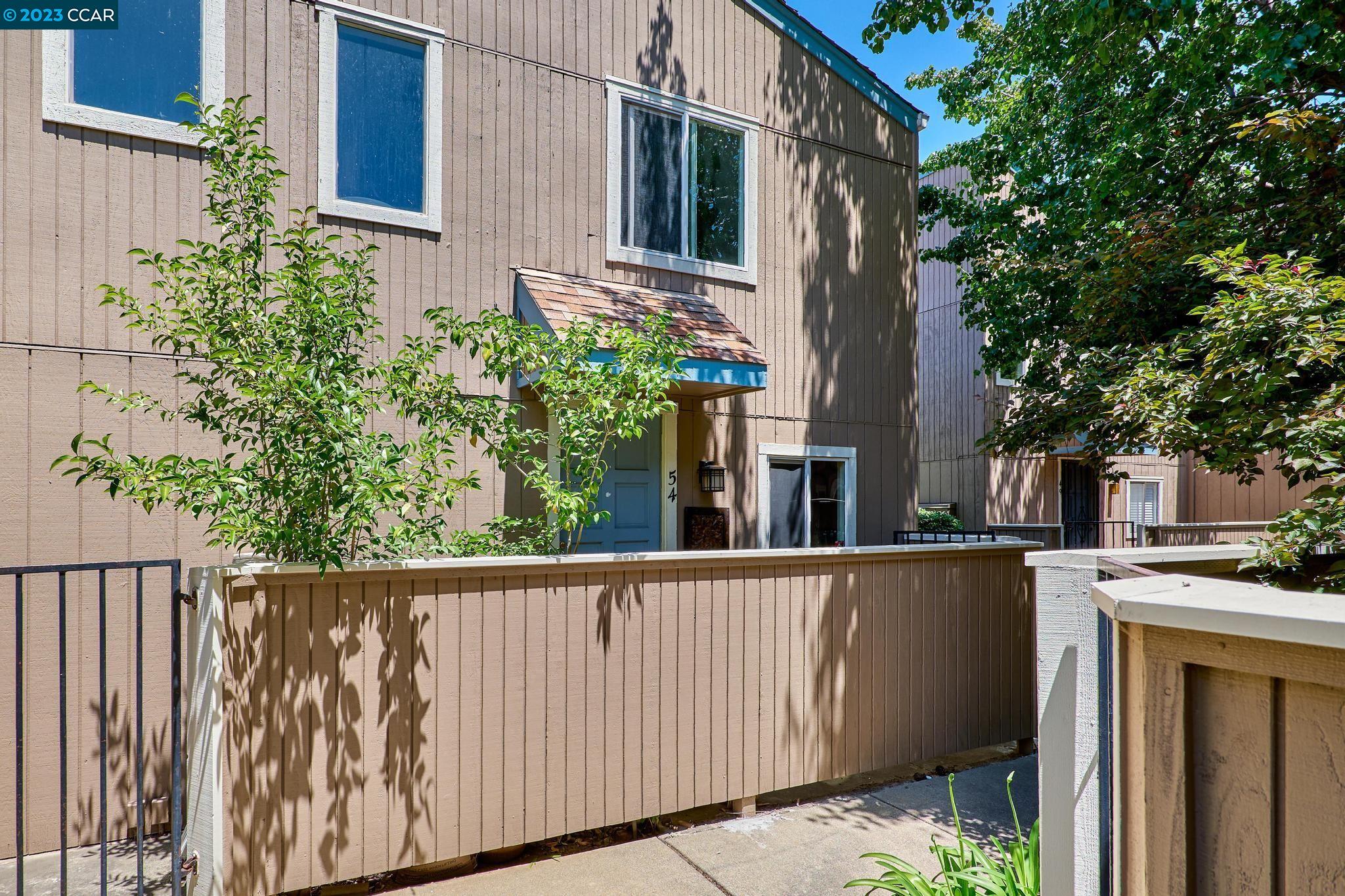 a side view of a house with a window