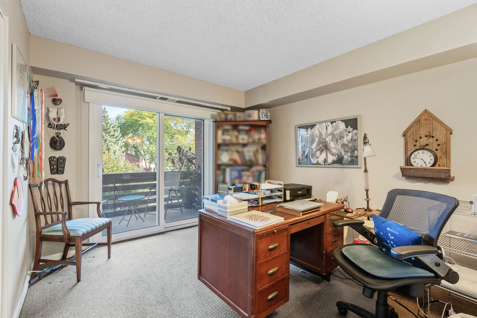 710 Waukegan Road, Unit 201 Glenview, IL 60025 - Photo 14 of 20 a room with furniture and a window
