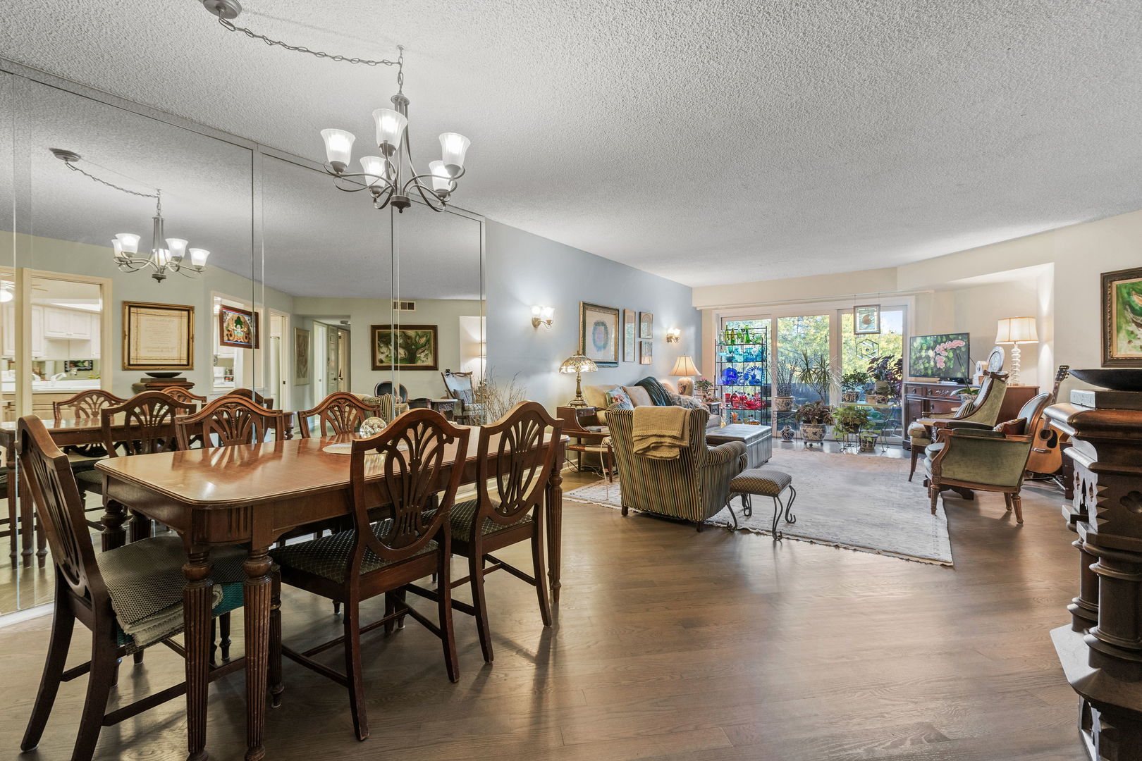 710 Waukegan Road, Unit 201 Glenview, IL 60025 - Photo 5 of 20 a view of a dining area with furniture window and wooden floor