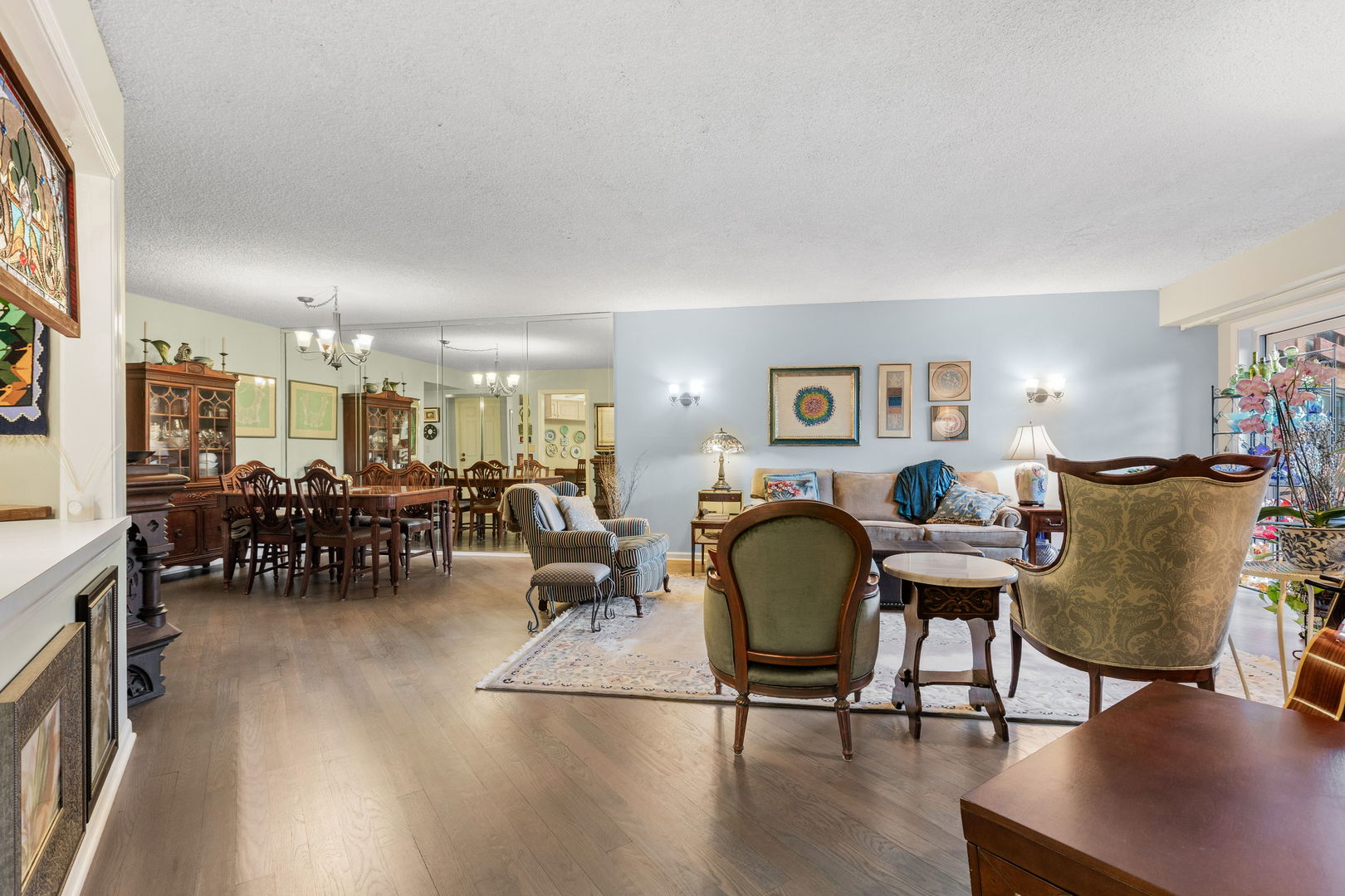 710 Waukegan Road, Unit 201 Glenview, IL 60025 - Photo 6 of 20 a living room with furniture and wooden floor