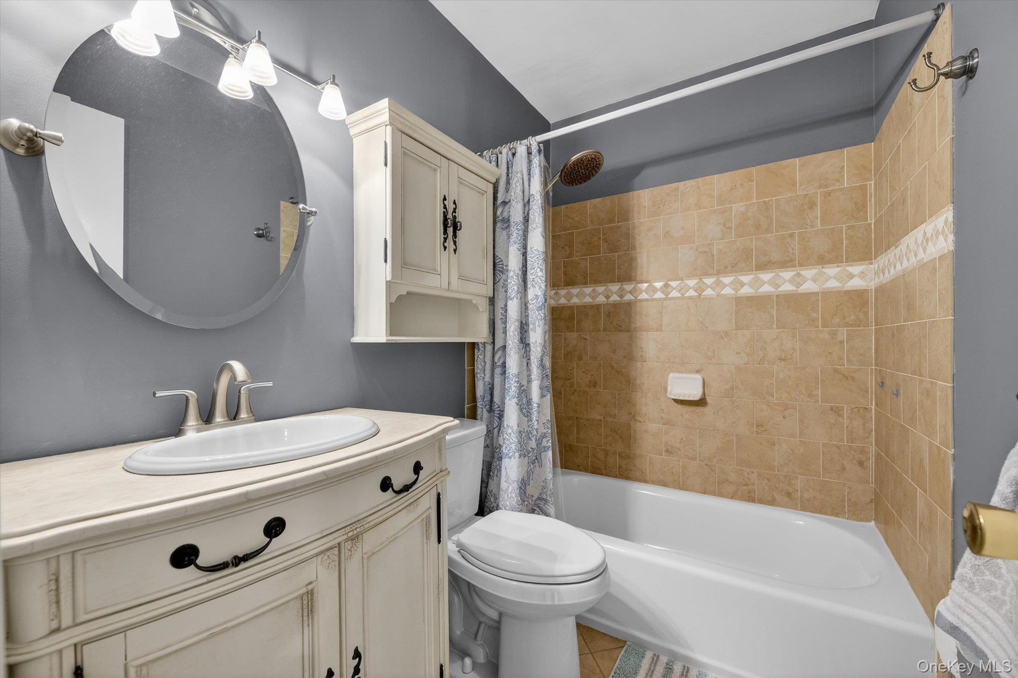 276 Temple Hill Road, Unit 1515 New Windsor, NY 12553 - Photo 15 of 28 a bathroom with a sink toilet and shower
