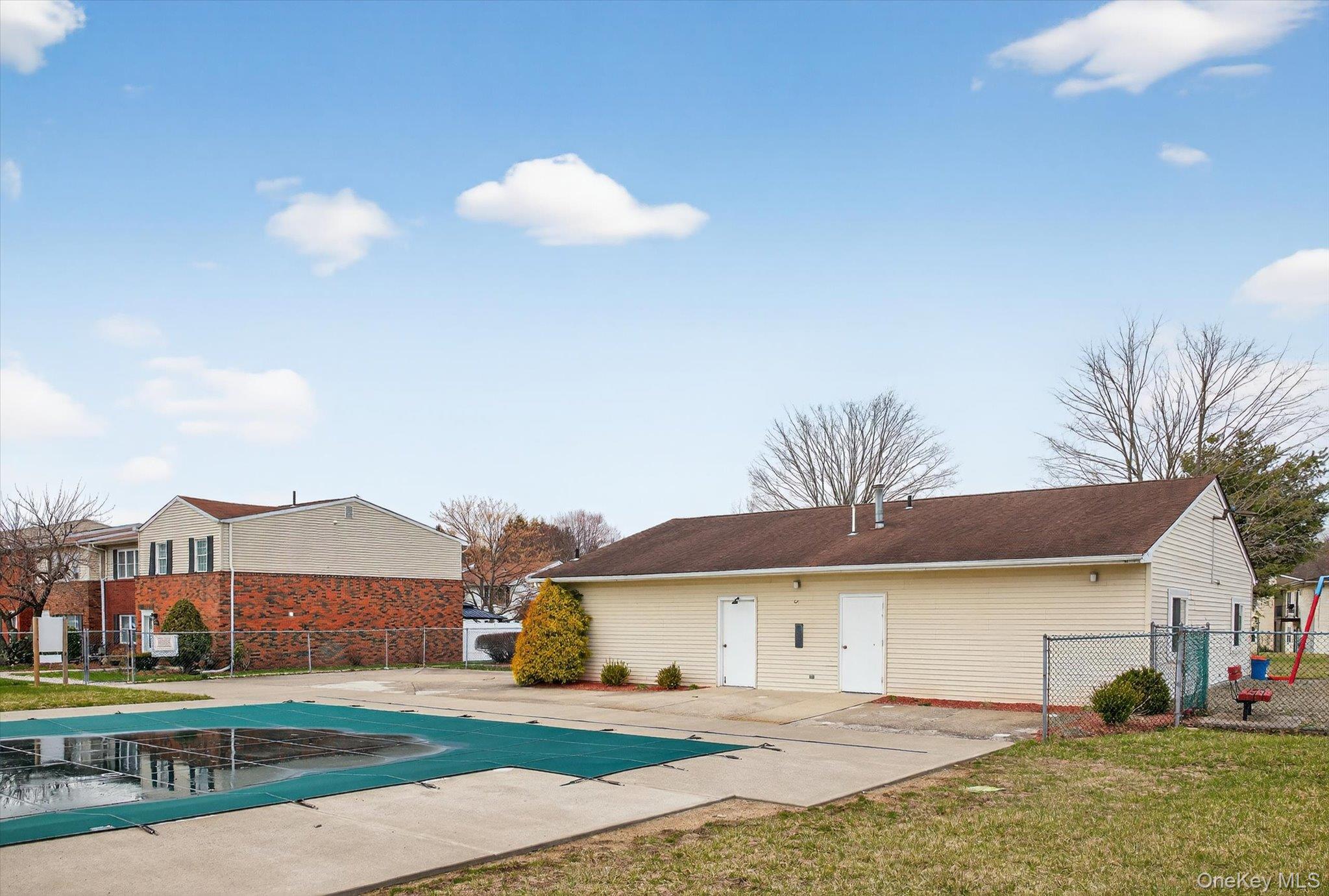 276 Temple Hill Road, Unit 1515 New Windsor, NY 12553 - Photo 26 of 28 a view of a house with a yard