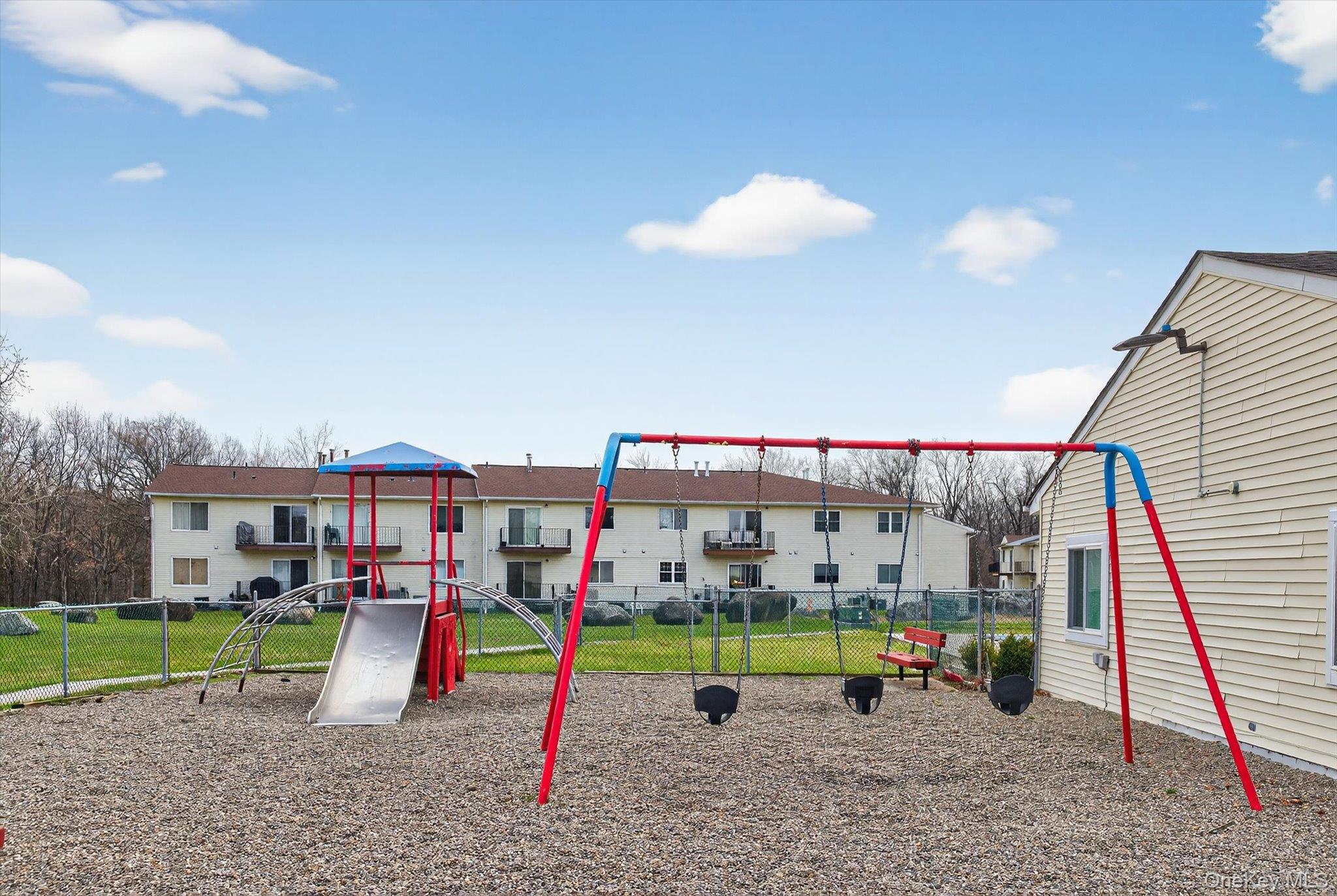 276 Temple Hill Road, Unit 1515 New Windsor, NY 12553 - Photo 28 of 28 a view of a park with swings