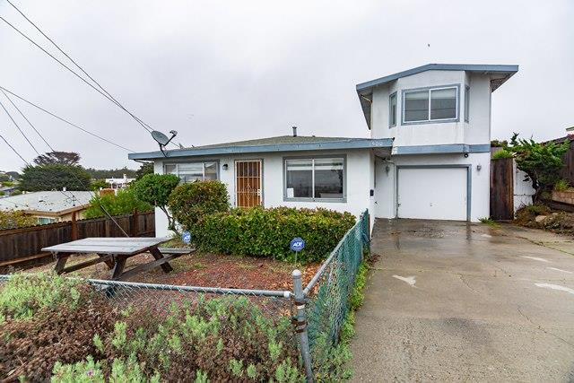 1500 Soto Street Seaside, CA 93955 - Photo 1 of 30 a front view of a house with a yard and potted plants