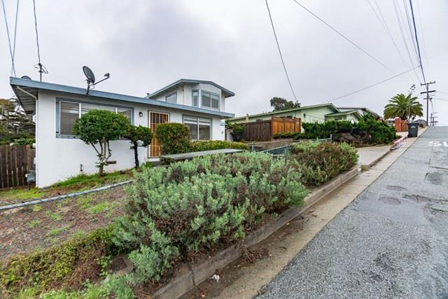 1500 Soto Street Seaside, CA 93955 - Photo 3 of 30 a front view of a house with a yard