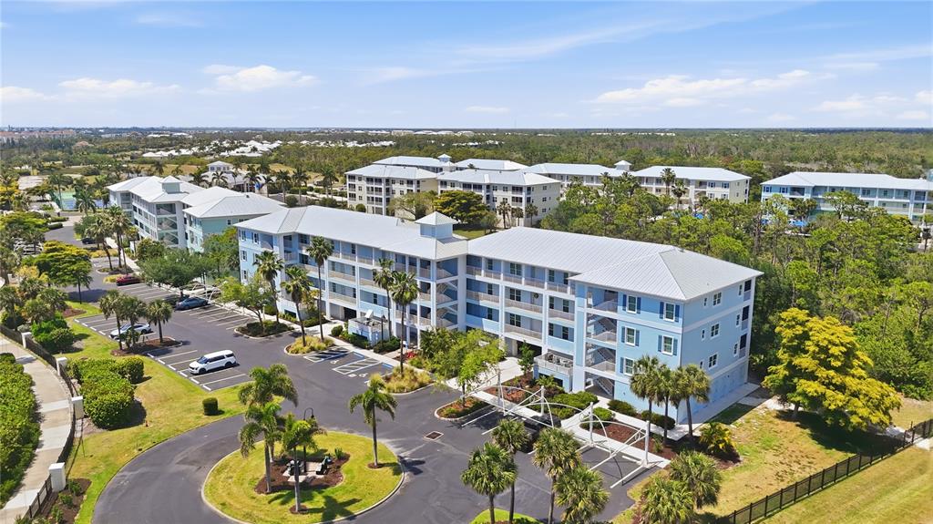 8405 Placida Road, Unit 204 Placida, FL 33946 - Photo 1 of 49 a view of a city with tall buildings