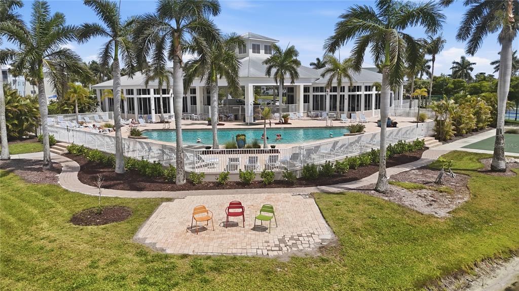 8405 Placida Road, Unit 204 Placida, FL 33946 - Photo 45 of 49 a view of swimming pool with palm trees