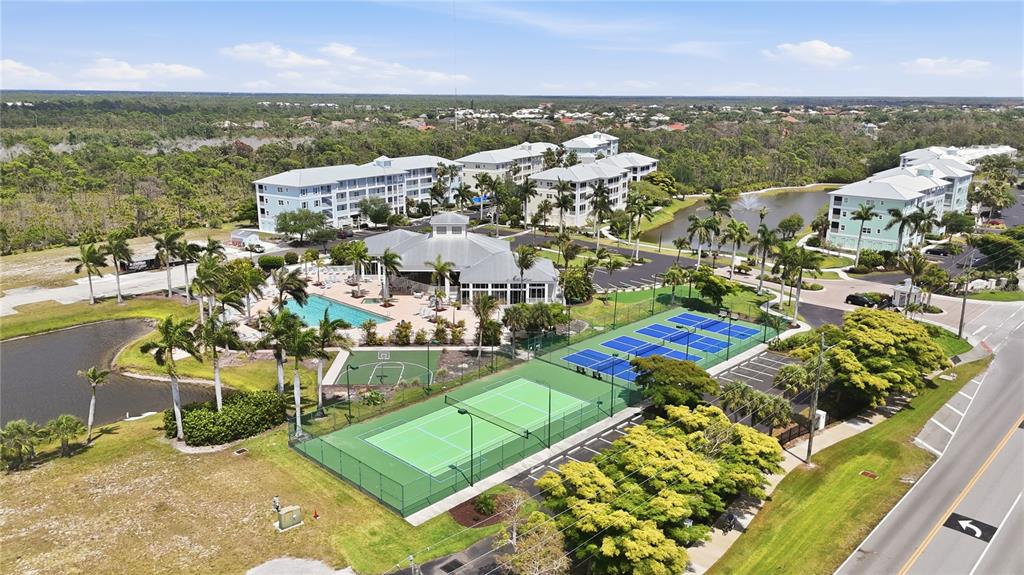 8405 Placida Road, Unit 204 Placida, FL 33946 - Photo 49 of 49 an aerial view of residential houses with outdoor space and river