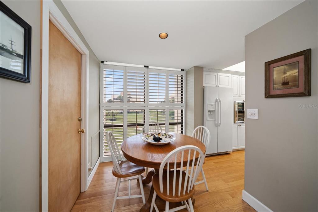 50 Coe Road, Unit 311 Belleair, FL 33756 - Photo 15 of 53 a view of a dining room with furniture and window