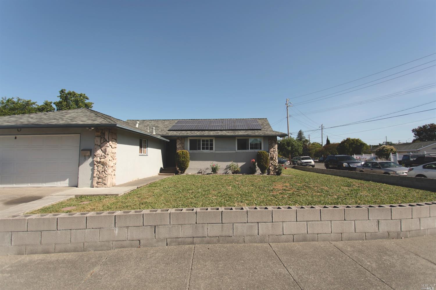 2501 Maya Court Santa Rosa, CA 95403 - Photo 1 of 1 a front view of a house with a yard and garage