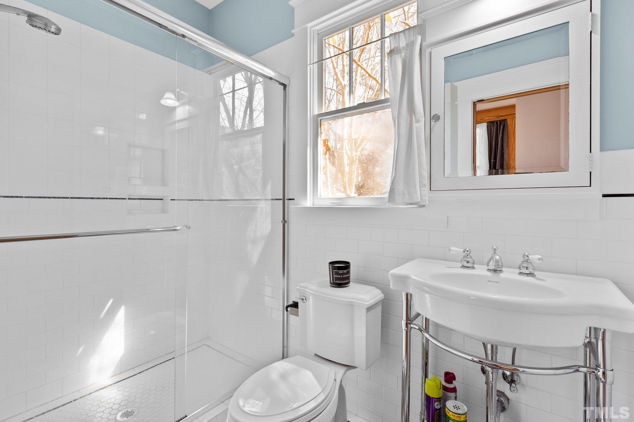 543 East Jones Street Raleigh, NC 27601 - Photo 17 of 31 a bathroom with a sink toilet and shower