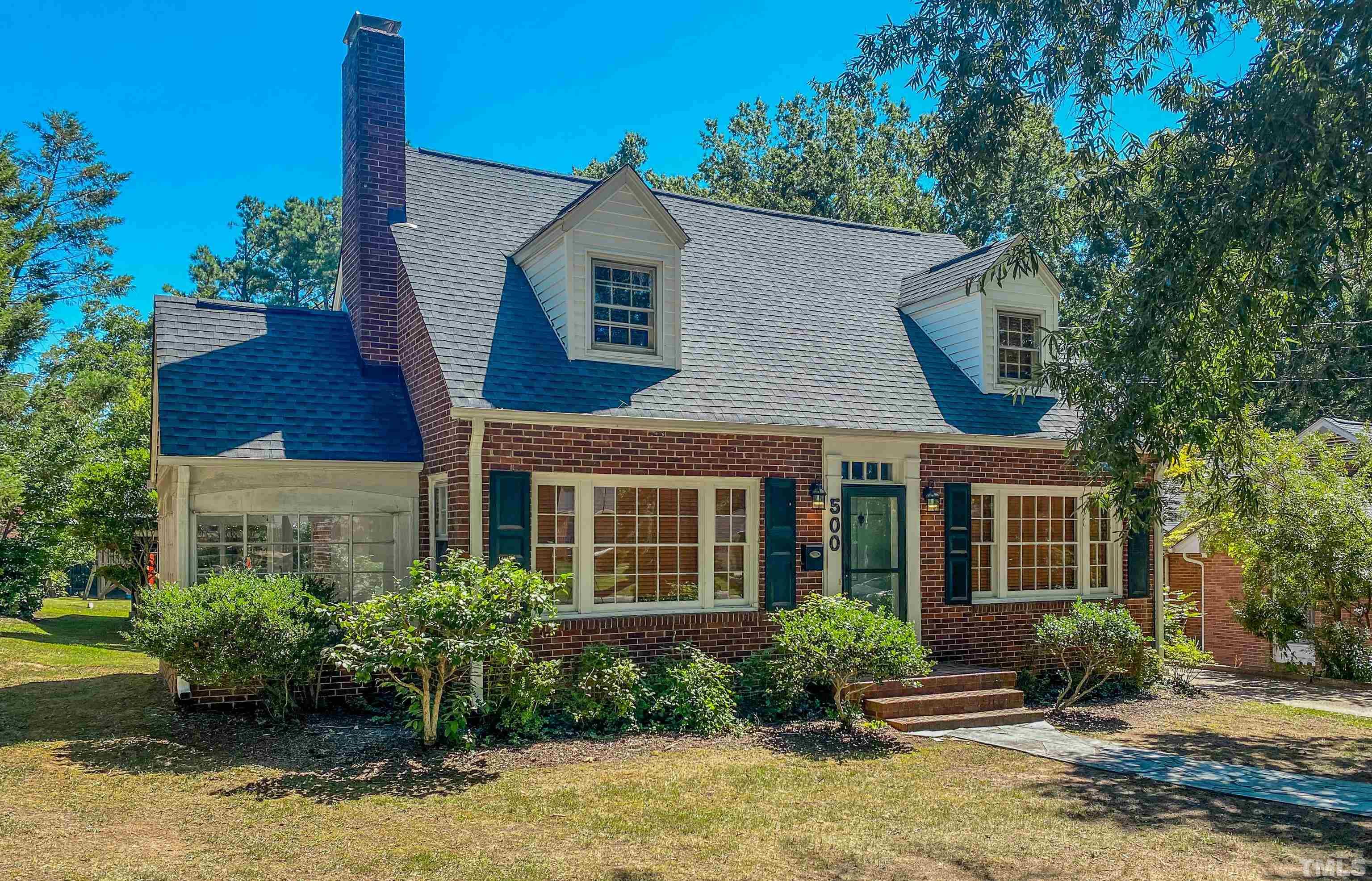 500 Gordon Street Roxboro, NC 27573 - Photo 1 of 70 a front view of a house with a yard