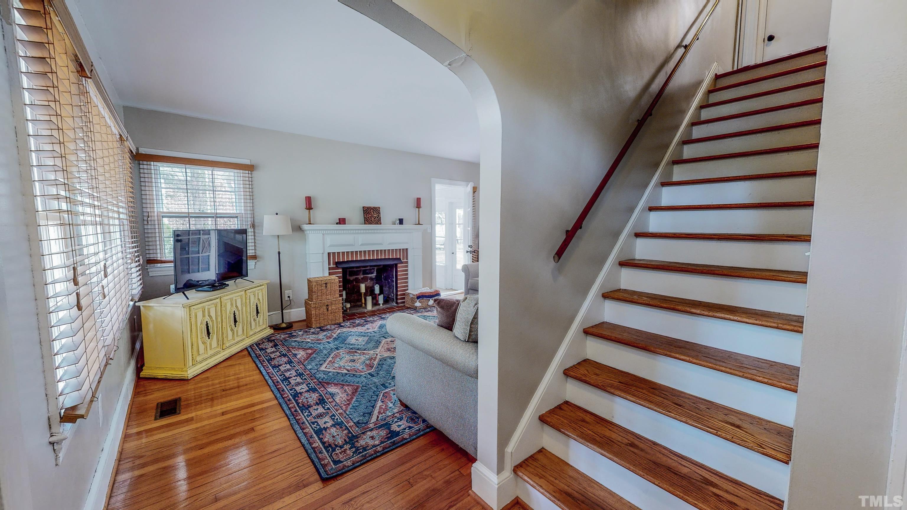 500 Gordon Street Roxboro, NC 27573 - Photo 29 of 70 a living room with furniture and a fireplace