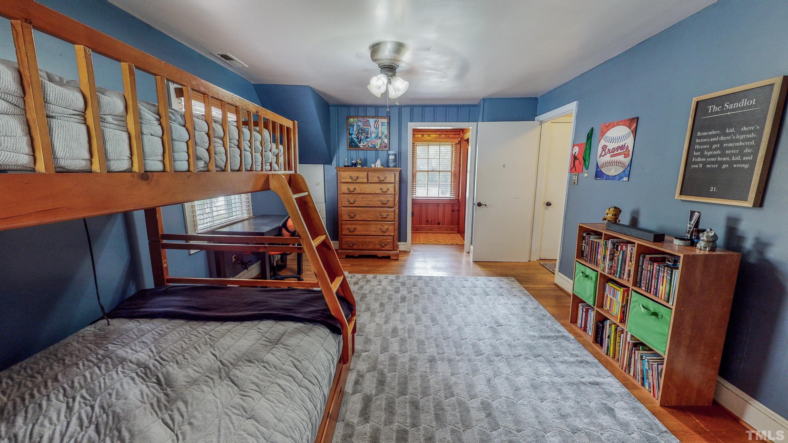 500 Gordon Street Roxboro, NC 27573 - Photo 31 of 70 a bedroom with furniture staircase and a ceiling fan