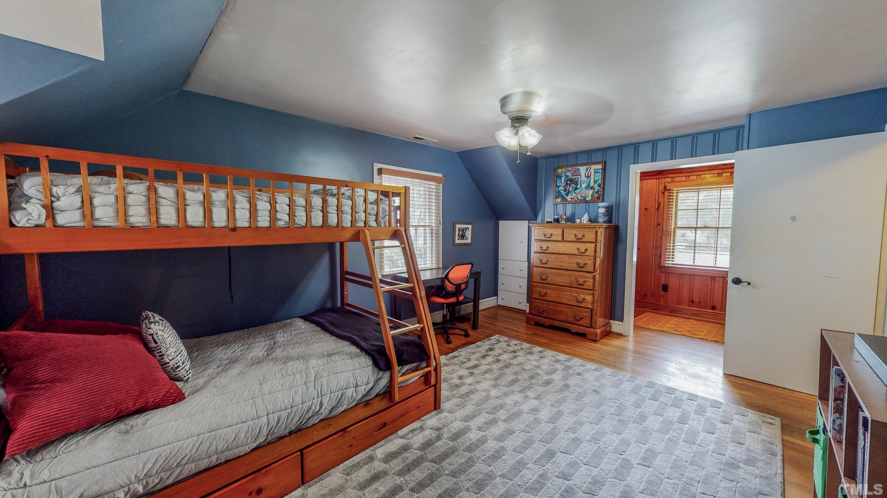 500 Gordon Street Roxboro, NC 27573 - Photo 32 of 70 a bedroom with a bed and a tv