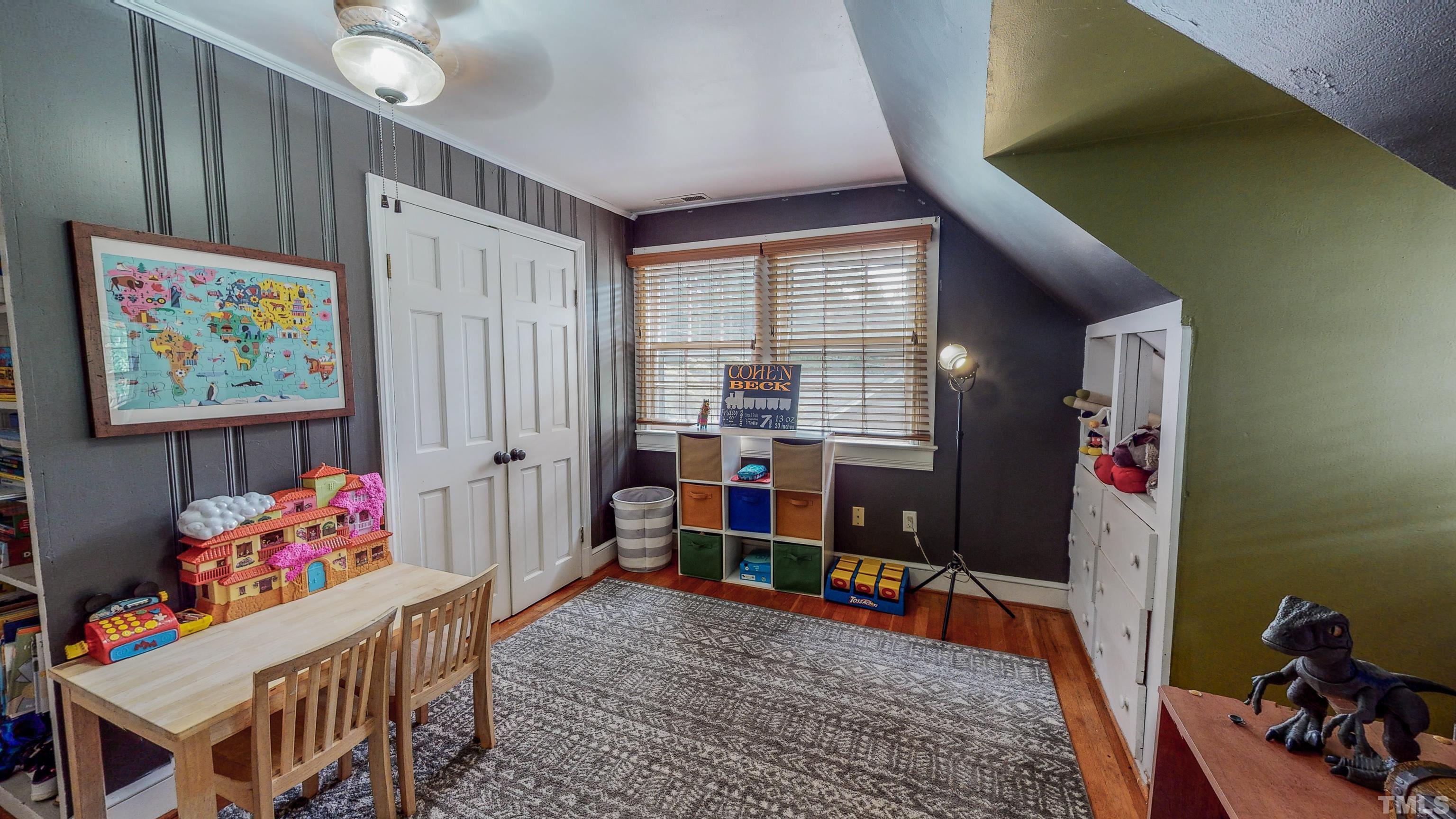 500 Gordon Street Roxboro, NC 27573 - Photo 36 of 70 a living room with baby crib furniture and a window