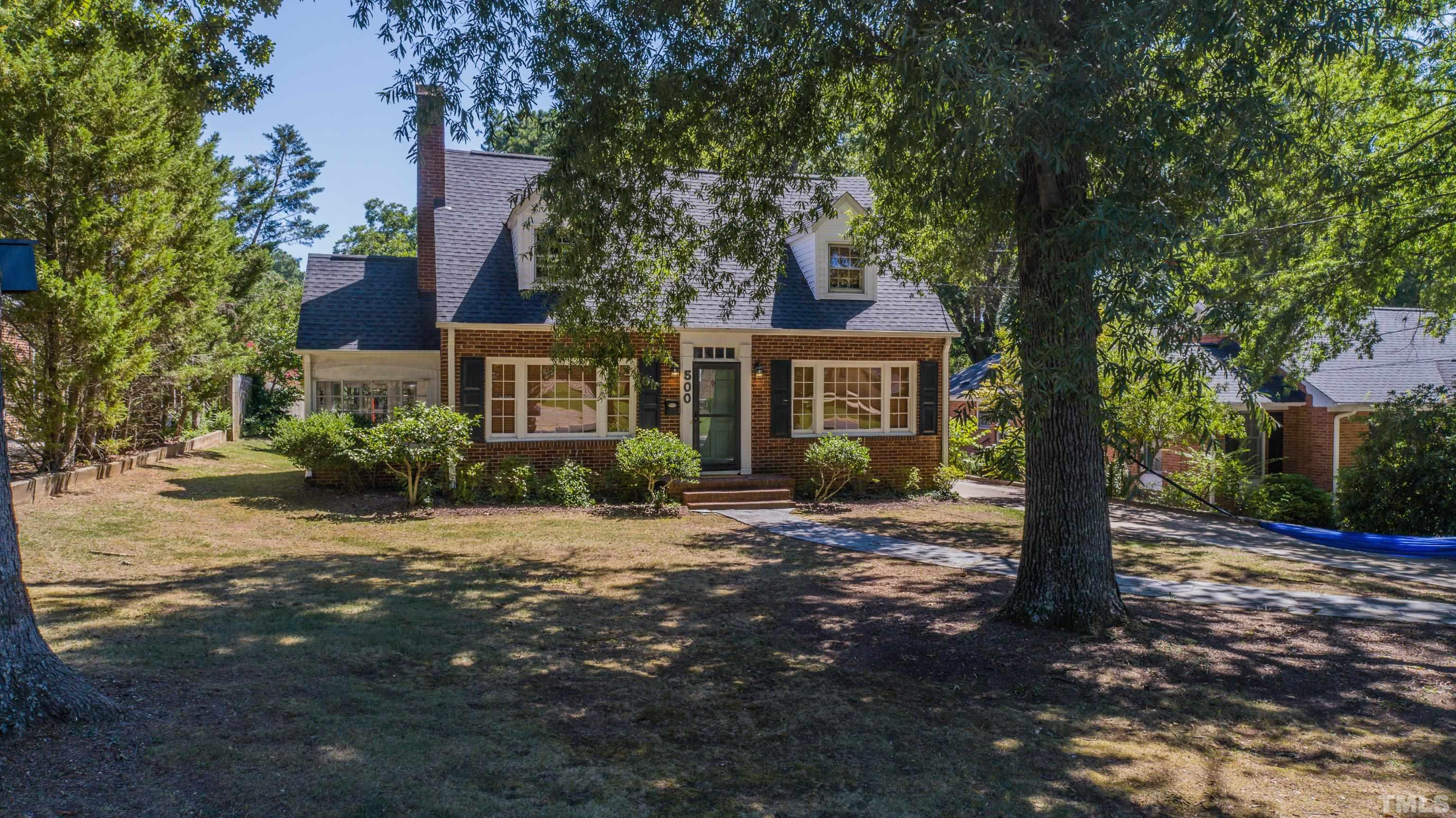 500 Gordon Street Roxboro, NC 27573 - Photo 49 of 70 a front view of a house with a tree in a yard