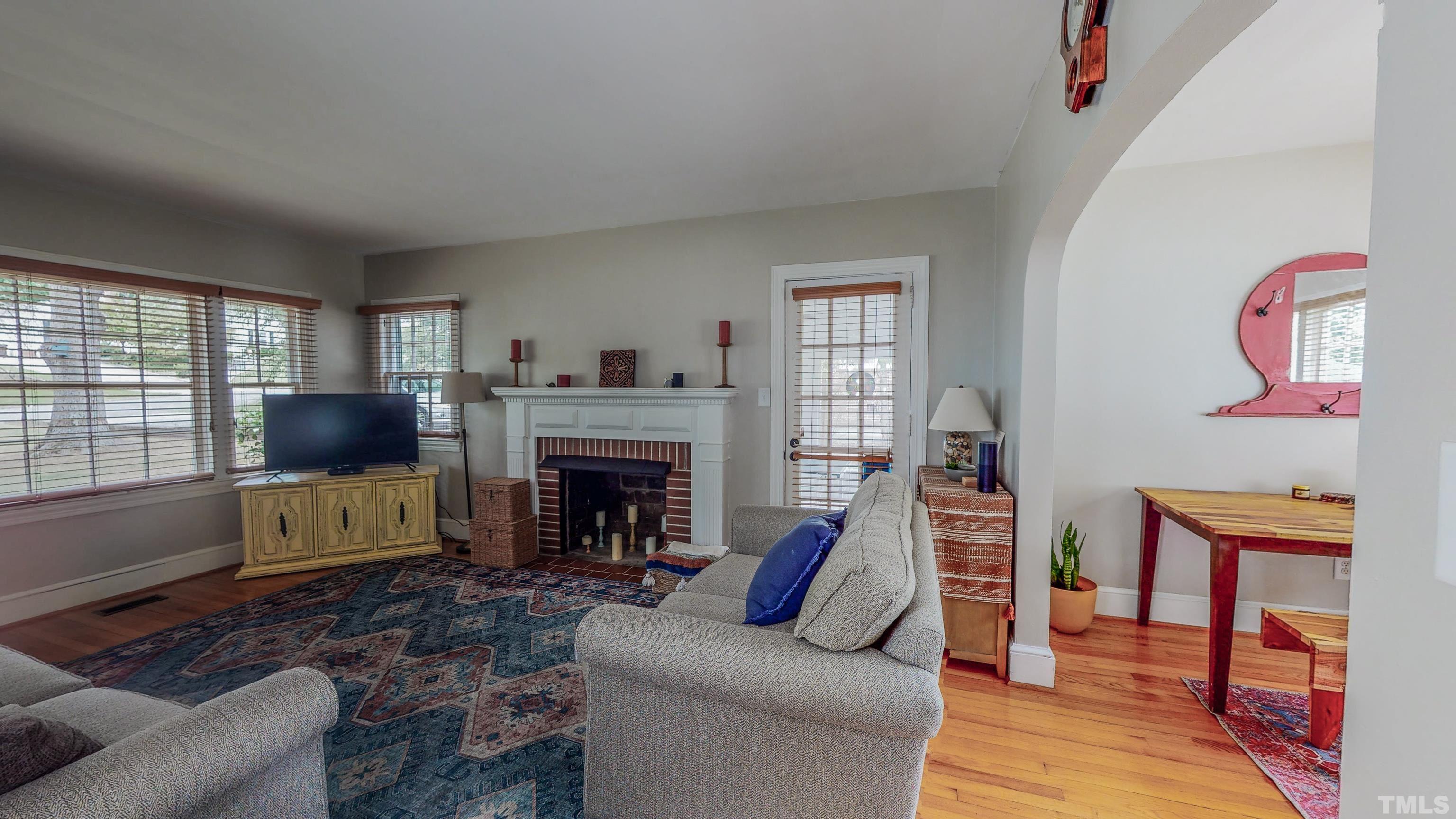 500 Gordon Street Roxboro, NC 27573 - Photo 52 of 70 a living room with furniture and a fireplace