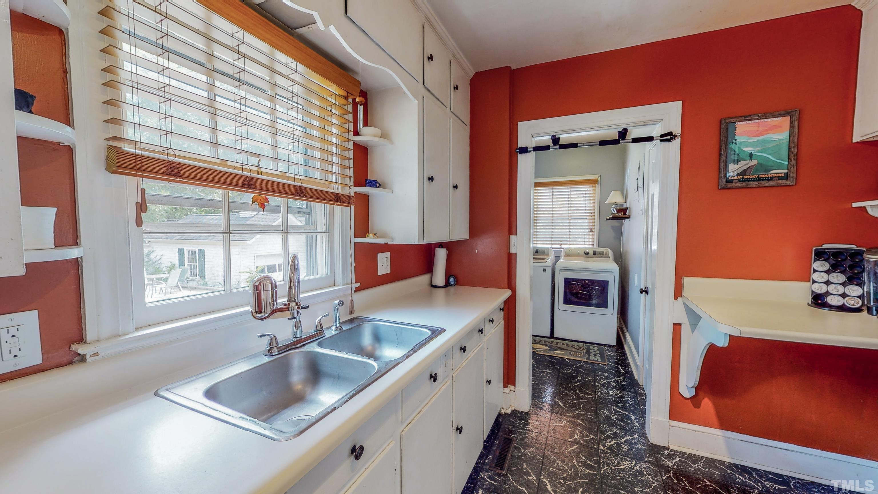 500 Gordon Street Roxboro, NC 27573 - Photo 56 of 70 a kitchen with a stove a sink and a cabinets