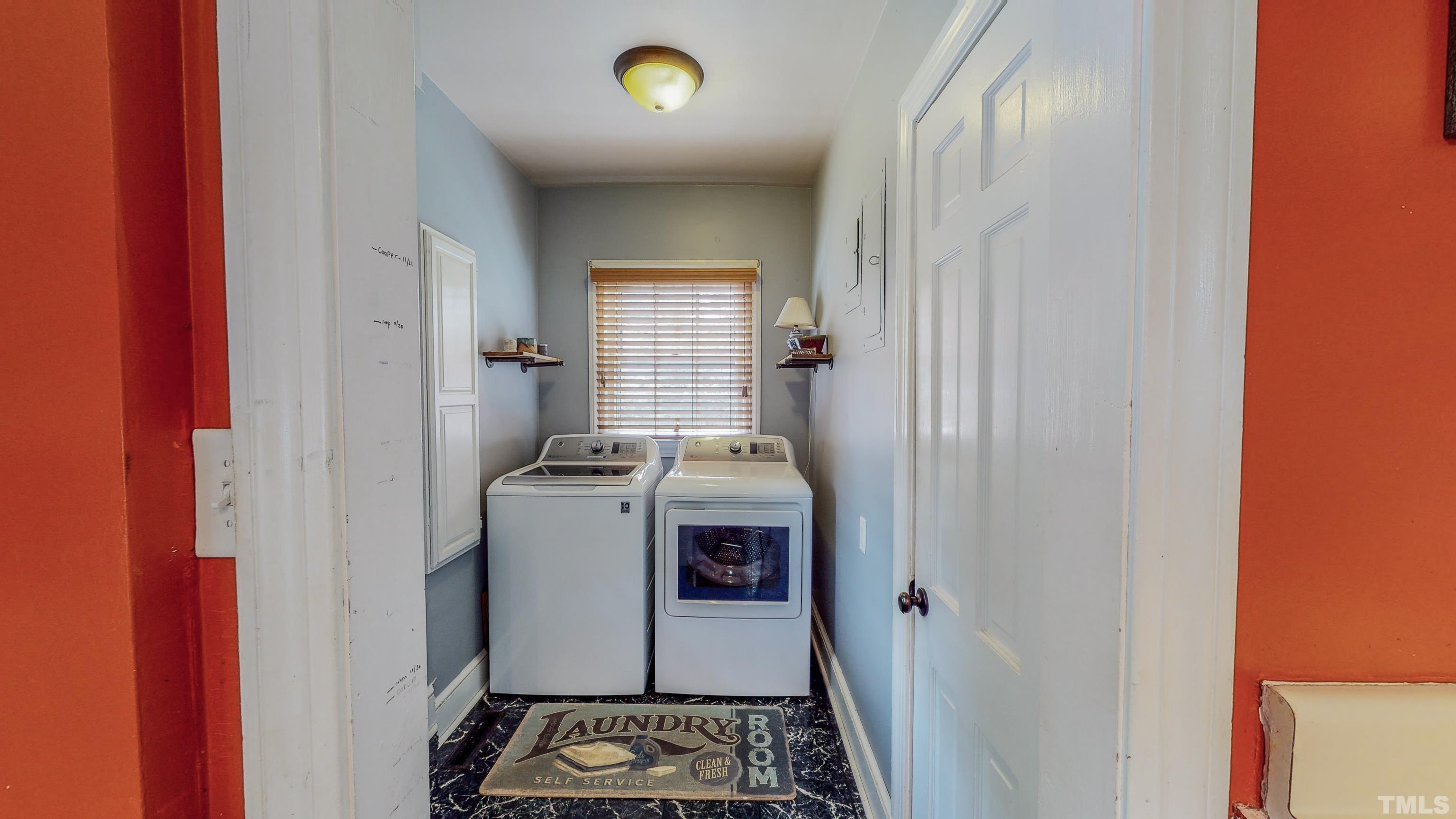 500 Gordon Street Roxboro, NC 27573 - Photo 57 of 70 a kitchen with a stove and a refrigerator