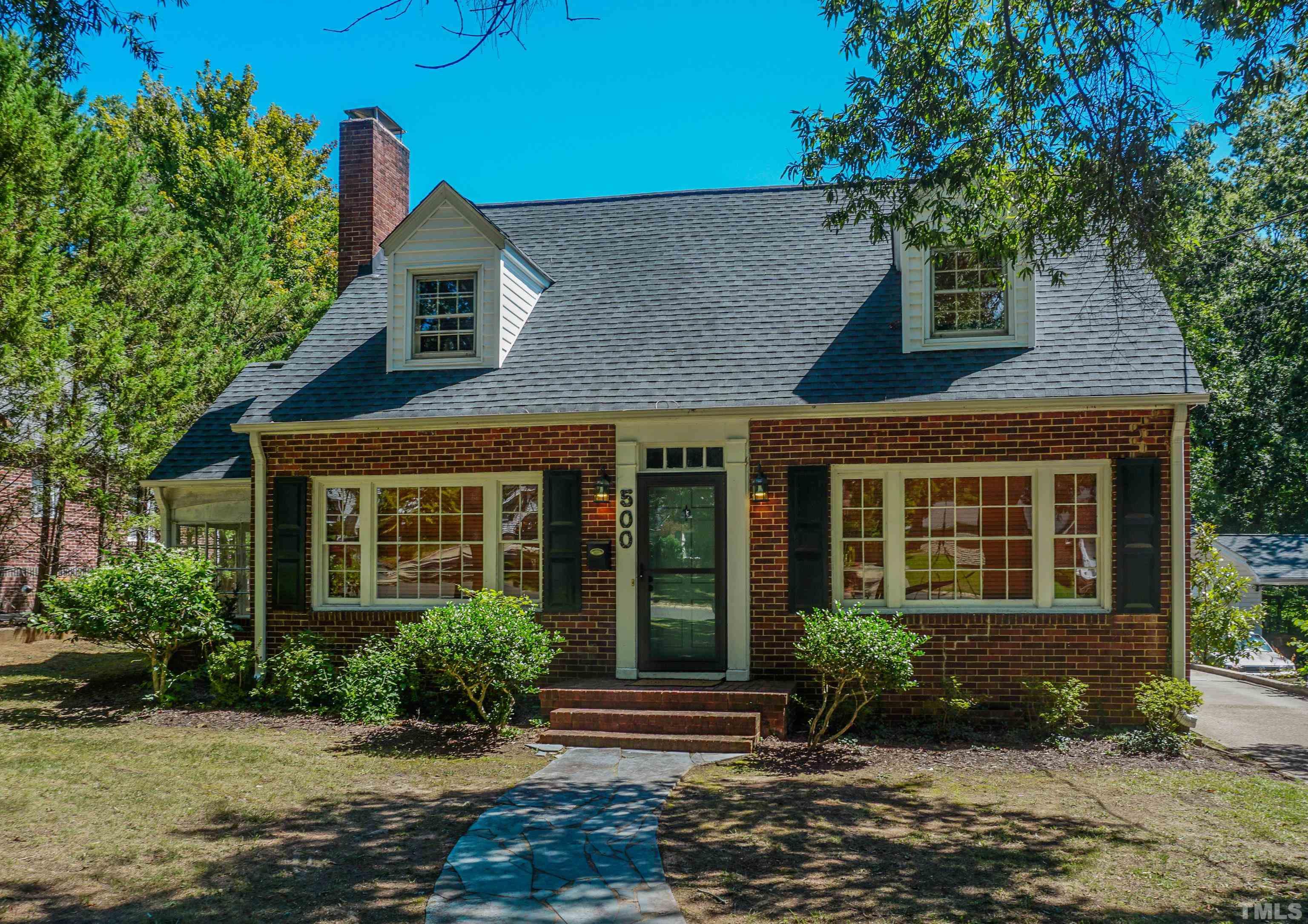 500 Gordon Street Roxboro, NC 27573 - Photo 65 of 70 a front view of a house with garden