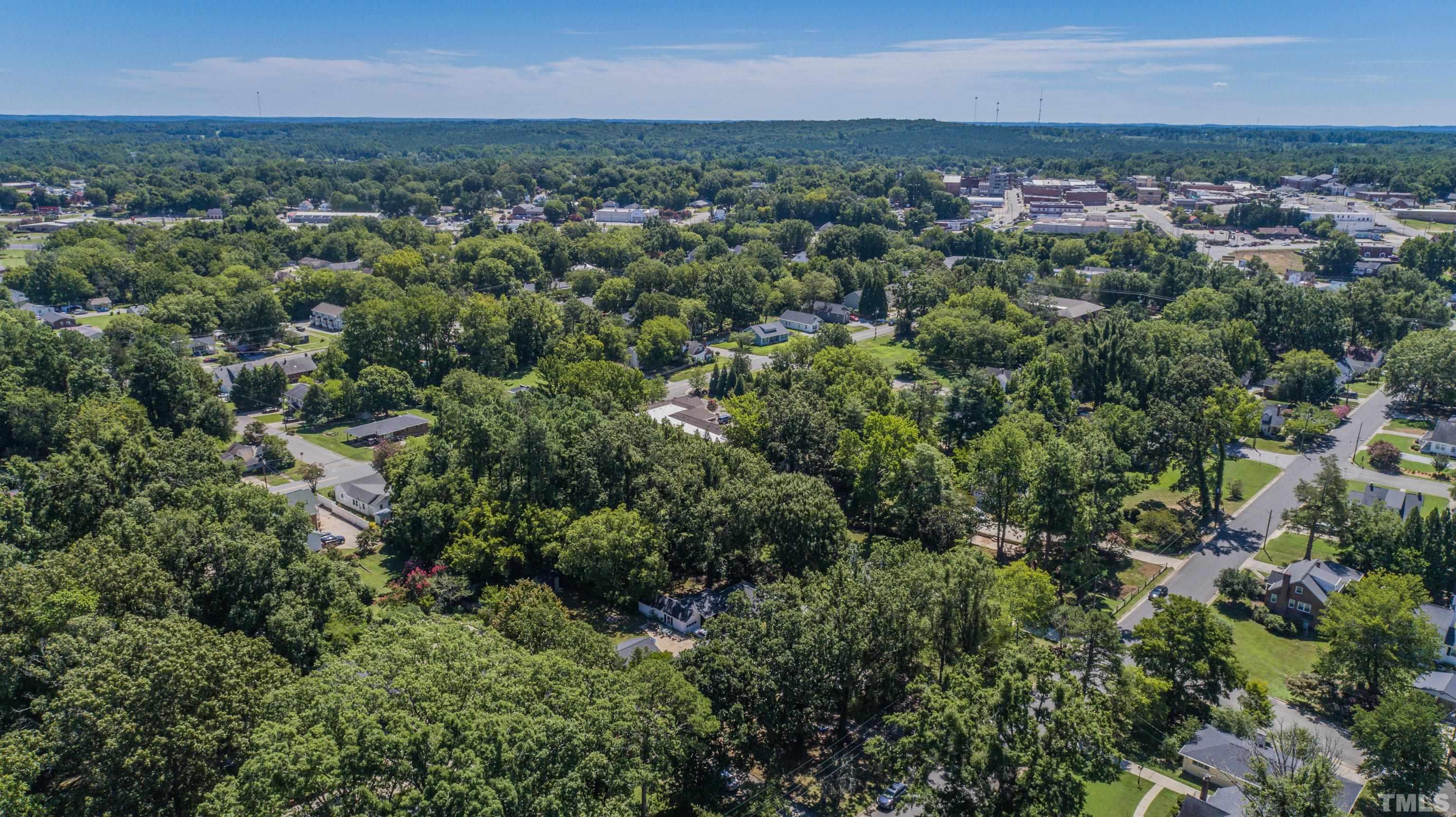 500 Gordon Street Roxboro, NC 27573 - Photo 69 of 70 an aerial view of a city and green space