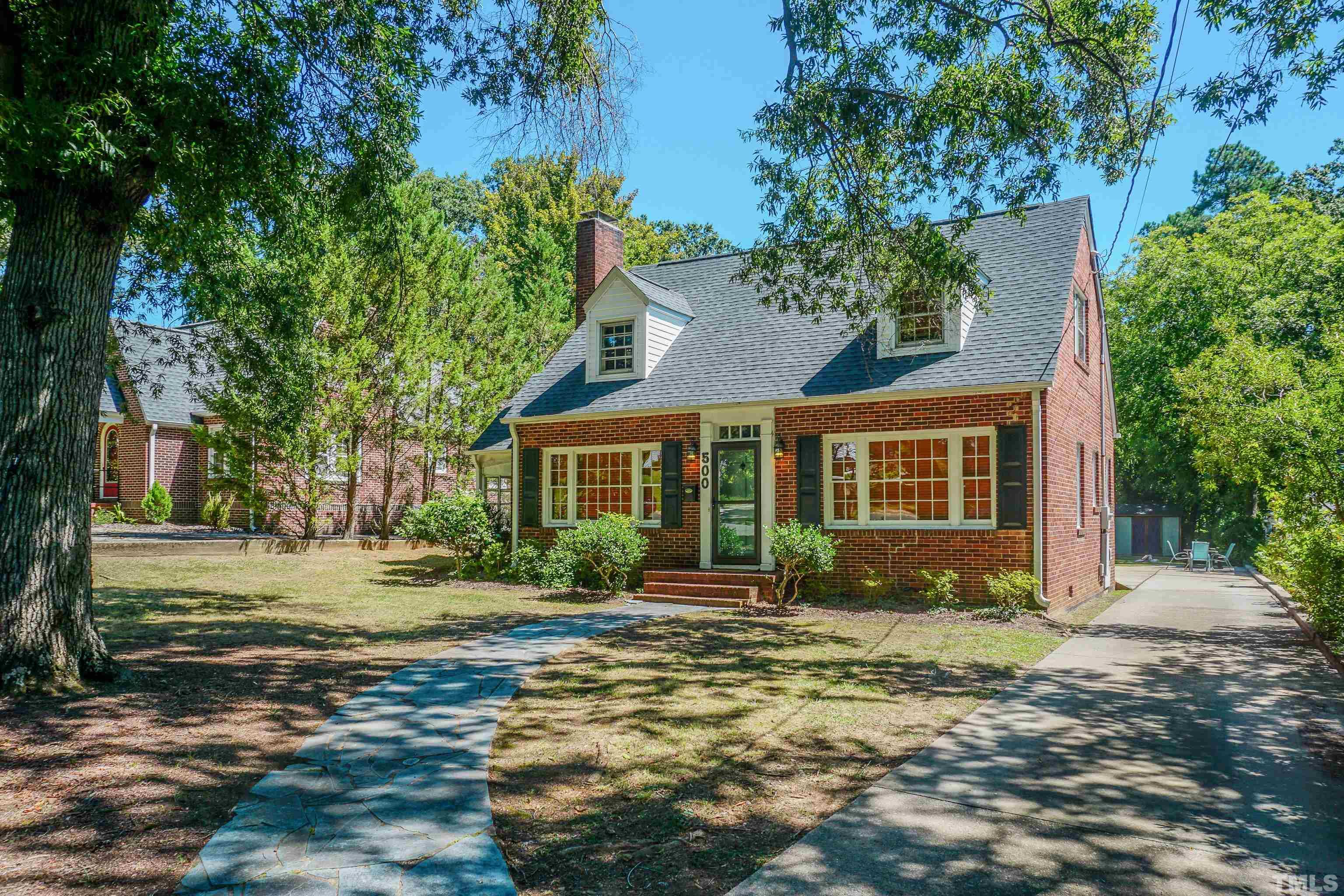 500 Gordon Street Roxboro, NC 27573 - Photo 7 of 70 a front view of a house with a yard