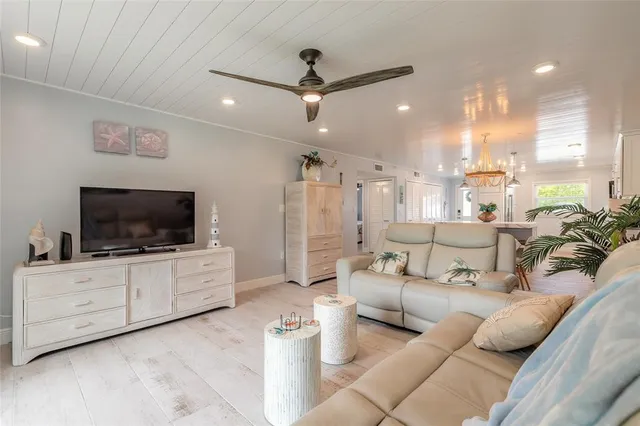 a kitchen with a table and chairs in it