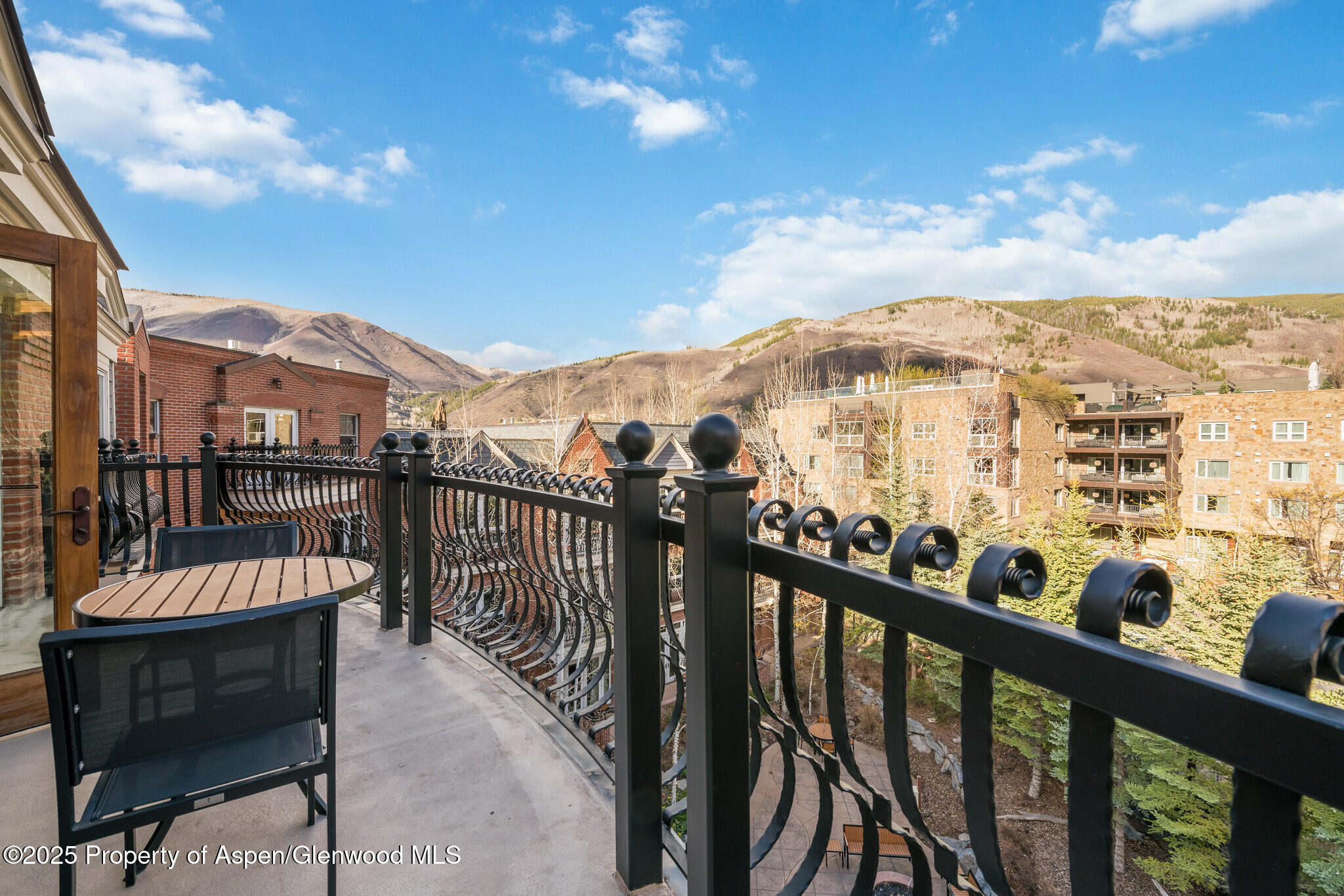 415 East Dean St Unit 49 Week 33 Aspen, CO 81611 - Photo 9 of 29 49BDeckViewtoRedMtnSmugglerMtn