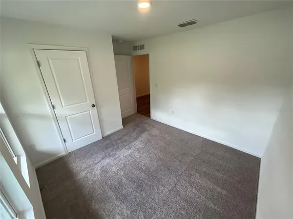 an empty room with a door