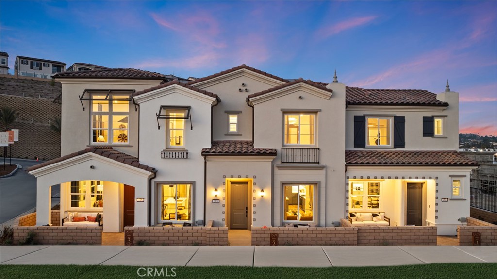 a front view of multiple houses