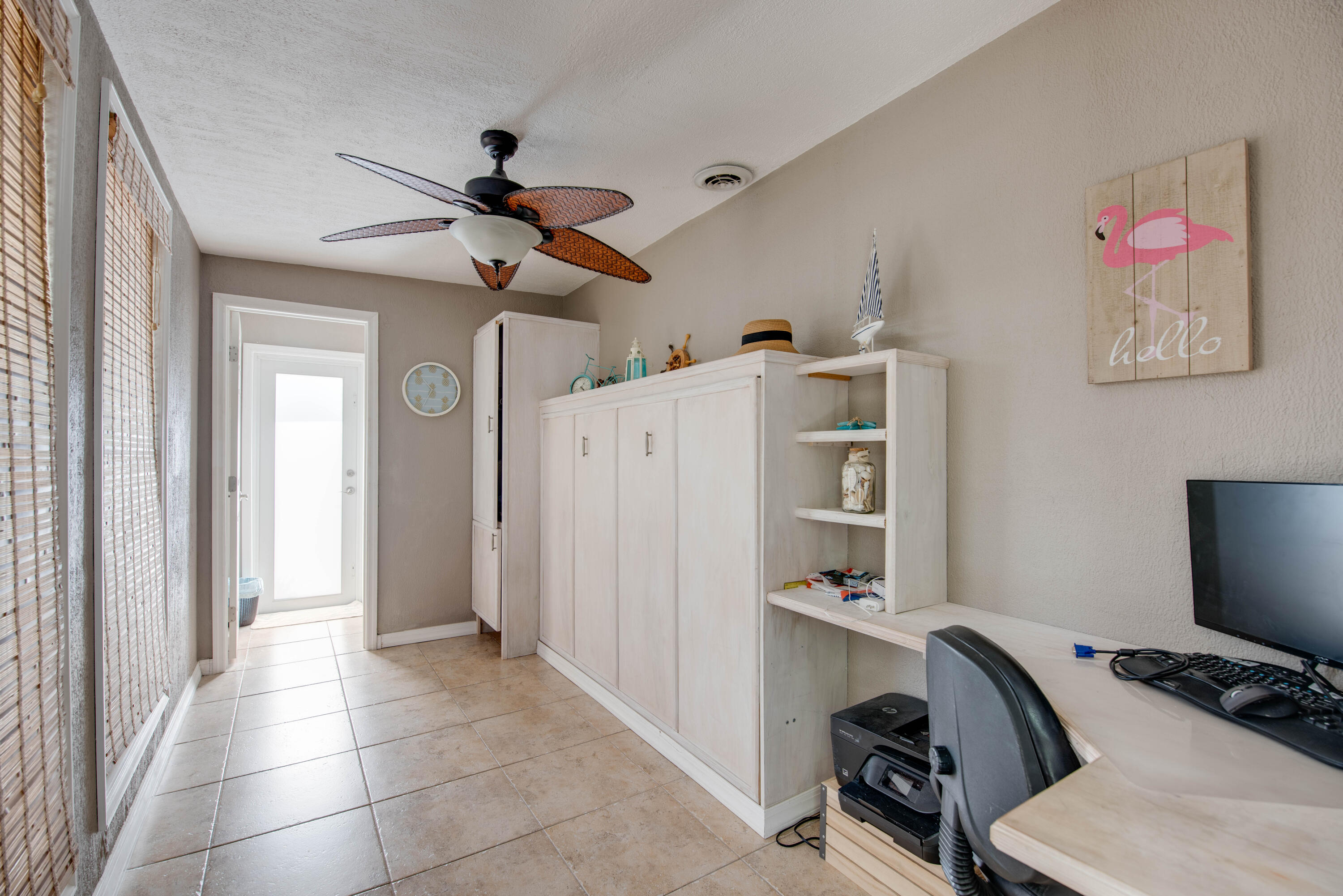 29013 Marigold Drive Big Pine Key, FL 33043 - Photo 15 of 52 a view of a workspace with furniture and a window
