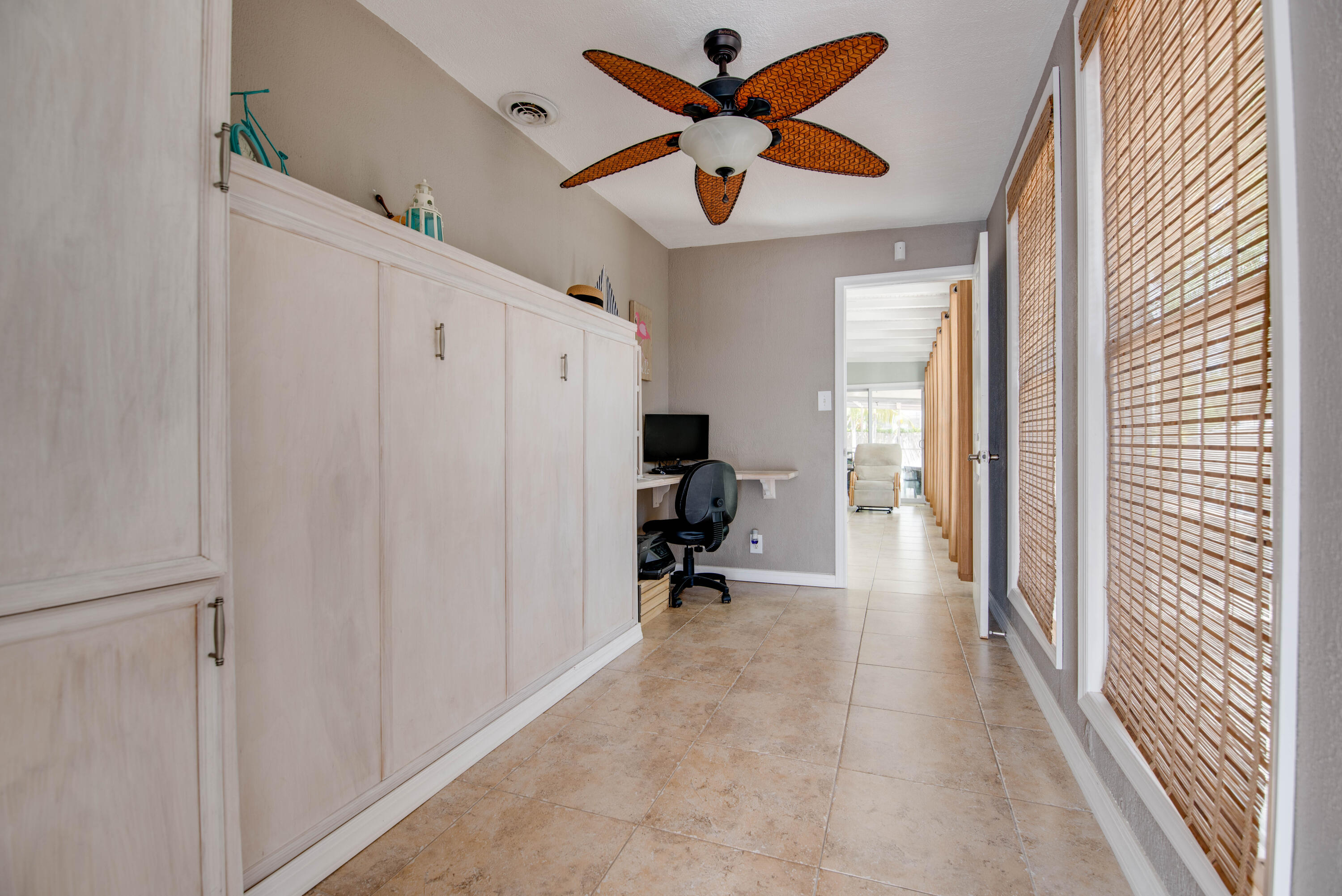 29013 Marigold Drive Big Pine Key, FL 33043 - Photo 16 of 52 a view of a hallway with workspace and a window