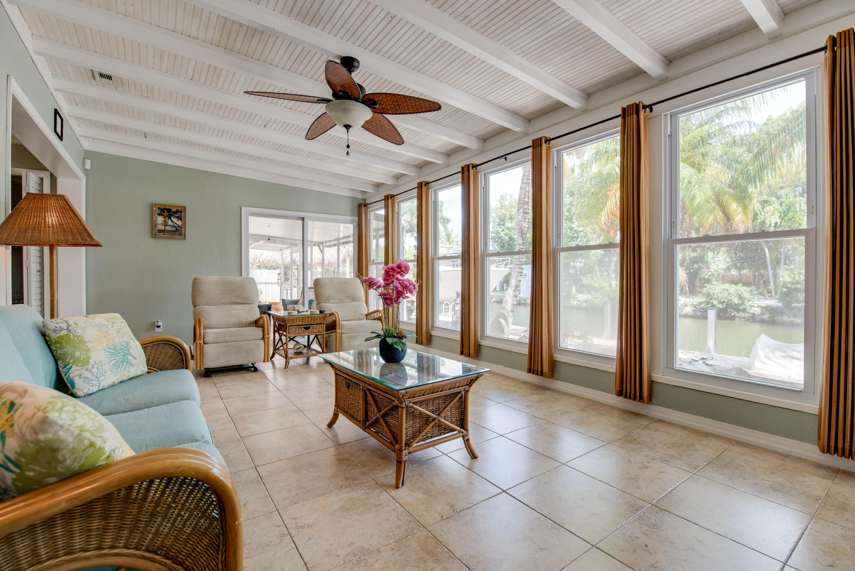 29013 Marigold Drive Big Pine Key, FL 33043 - Photo 18 of 52 a living room with furniture and a large window
