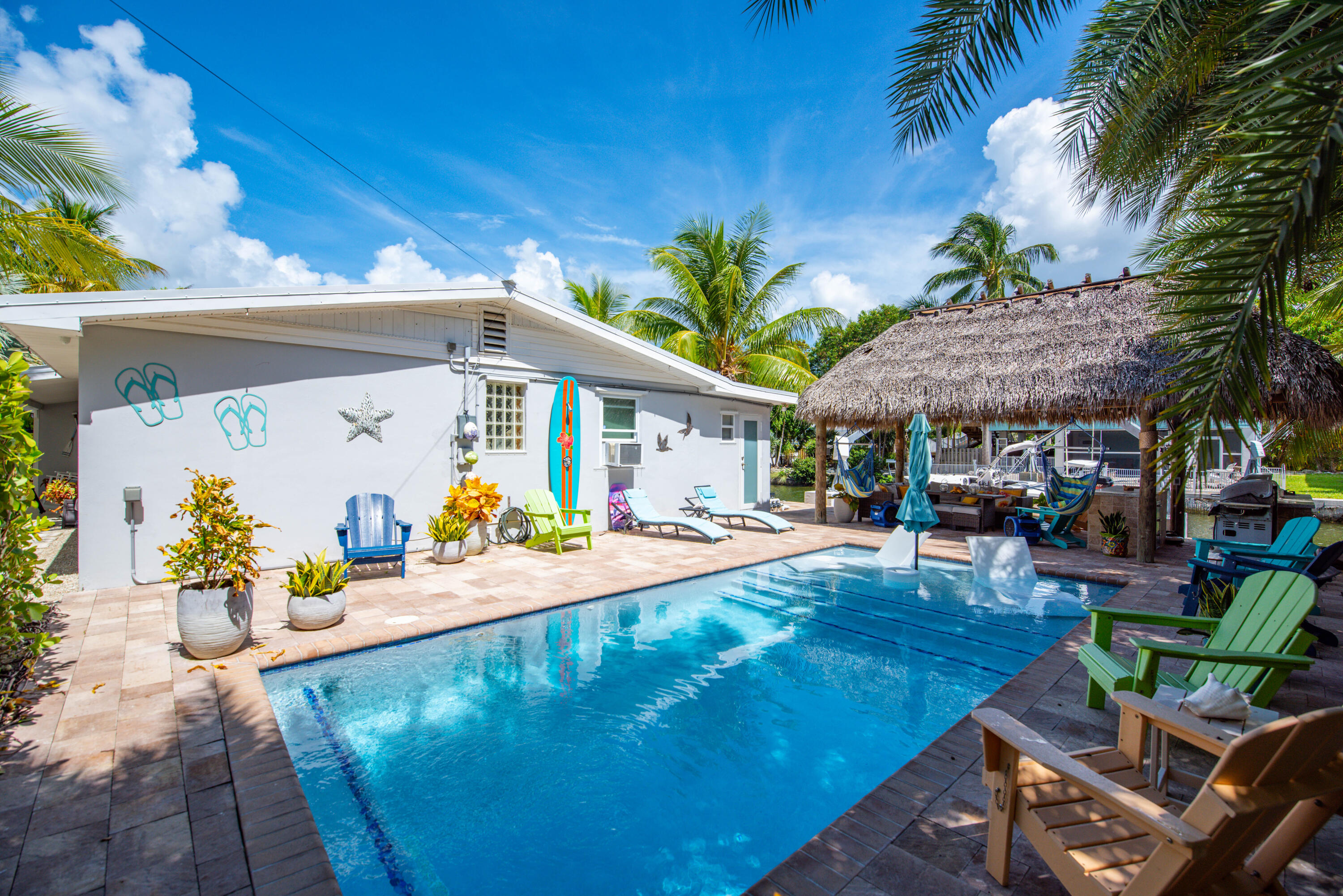 29013 Marigold Drive Big Pine Key, FL 33043 - Photo 22 of 52 a view of a chairs and table in the patio
