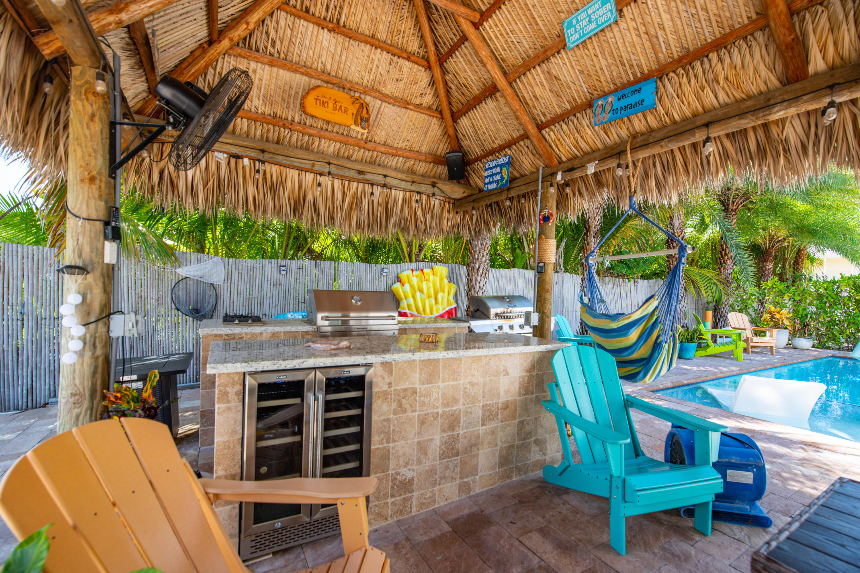 29013 Marigold Drive Big Pine Key, FL 33043 - Photo 27 of 52 a patio area with table and chairs