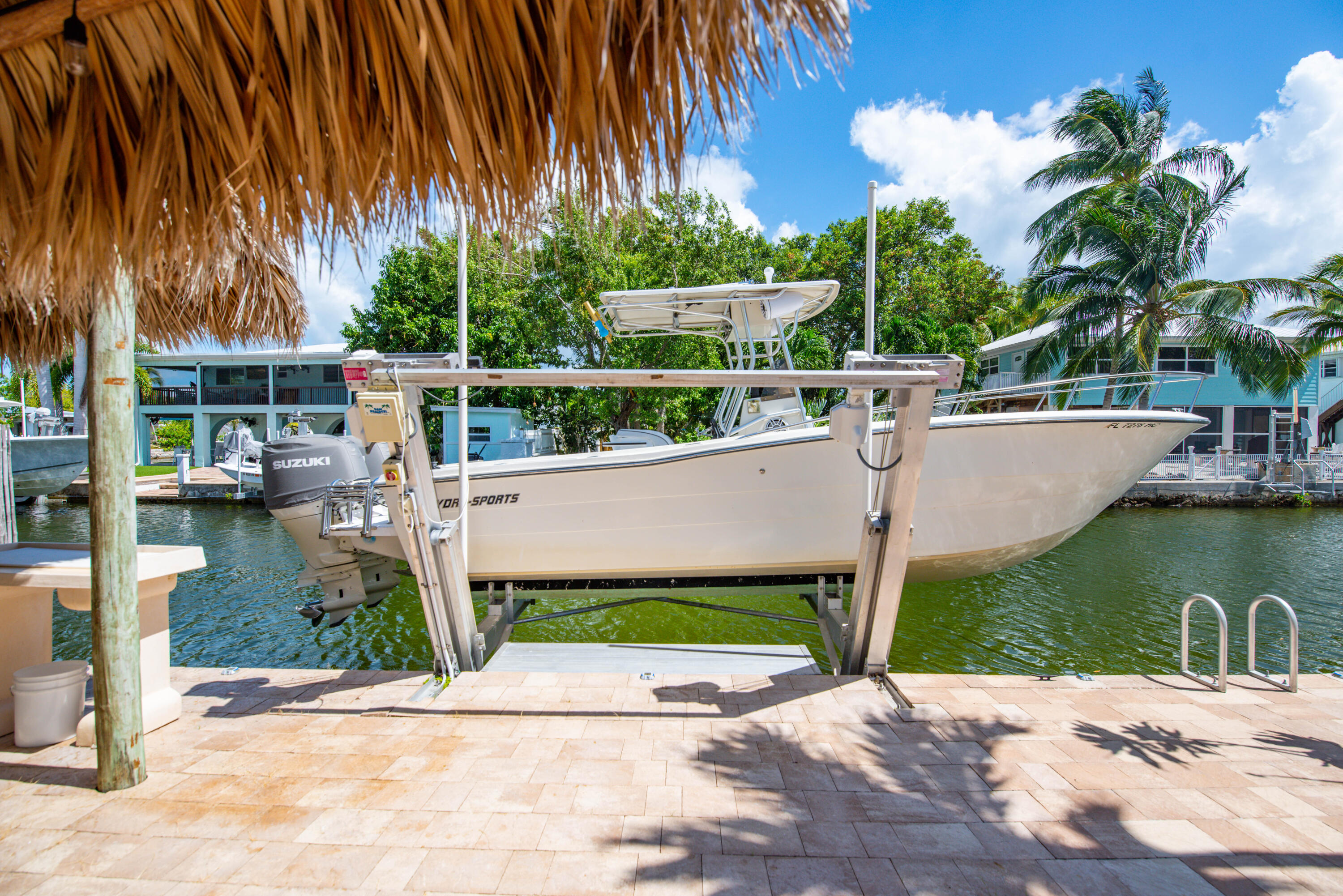 29013 Marigold Drive Big Pine Key, FL 33043 - Photo 34 of 52 a view of a patio with chairs and a table with chairs