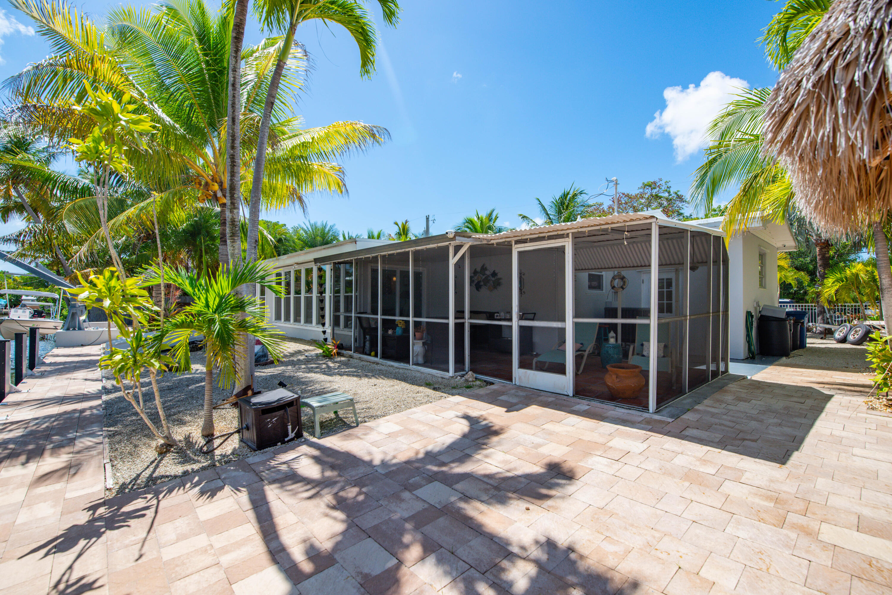 29013 Marigold Drive Big Pine Key, FL 33043 - Photo 36 of 52 a view of a chair and table in the patio