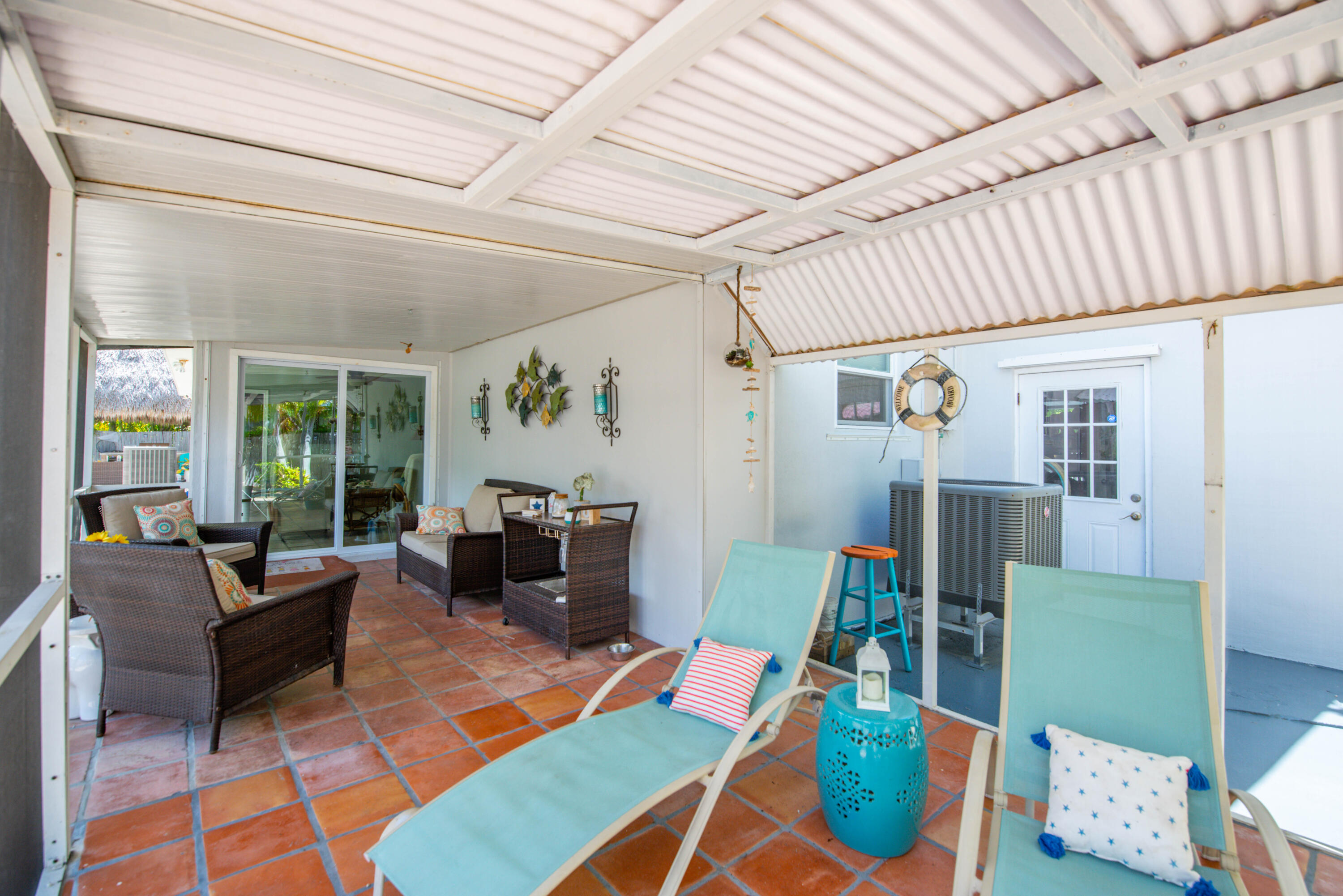 29013 Marigold Drive Big Pine Key, FL 33043 - Photo 37 of 52 a living room with furniture and wooden floor