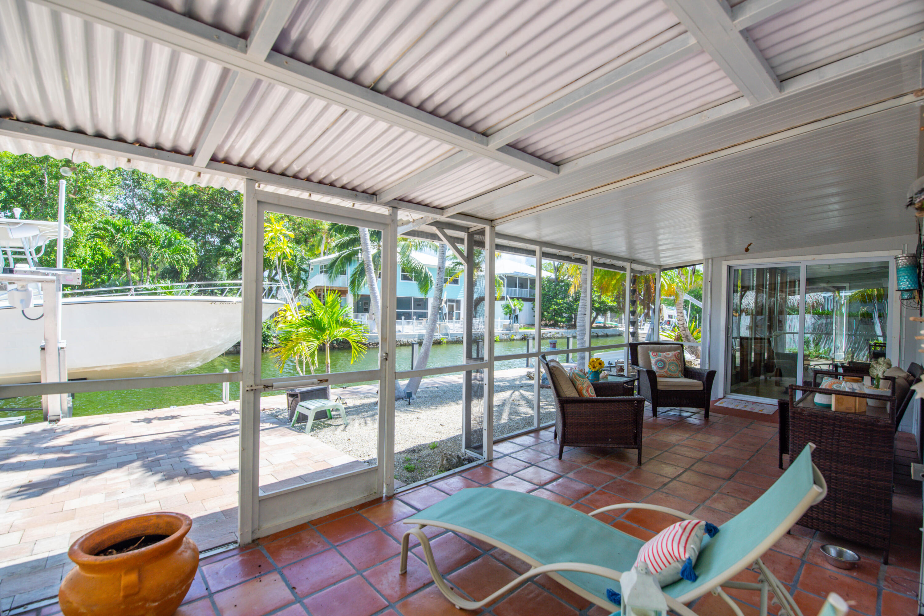 29013 Marigold Drive Big Pine Key, FL 33043 - Photo 38 of 52 a outdoor space with patio the couches and pool