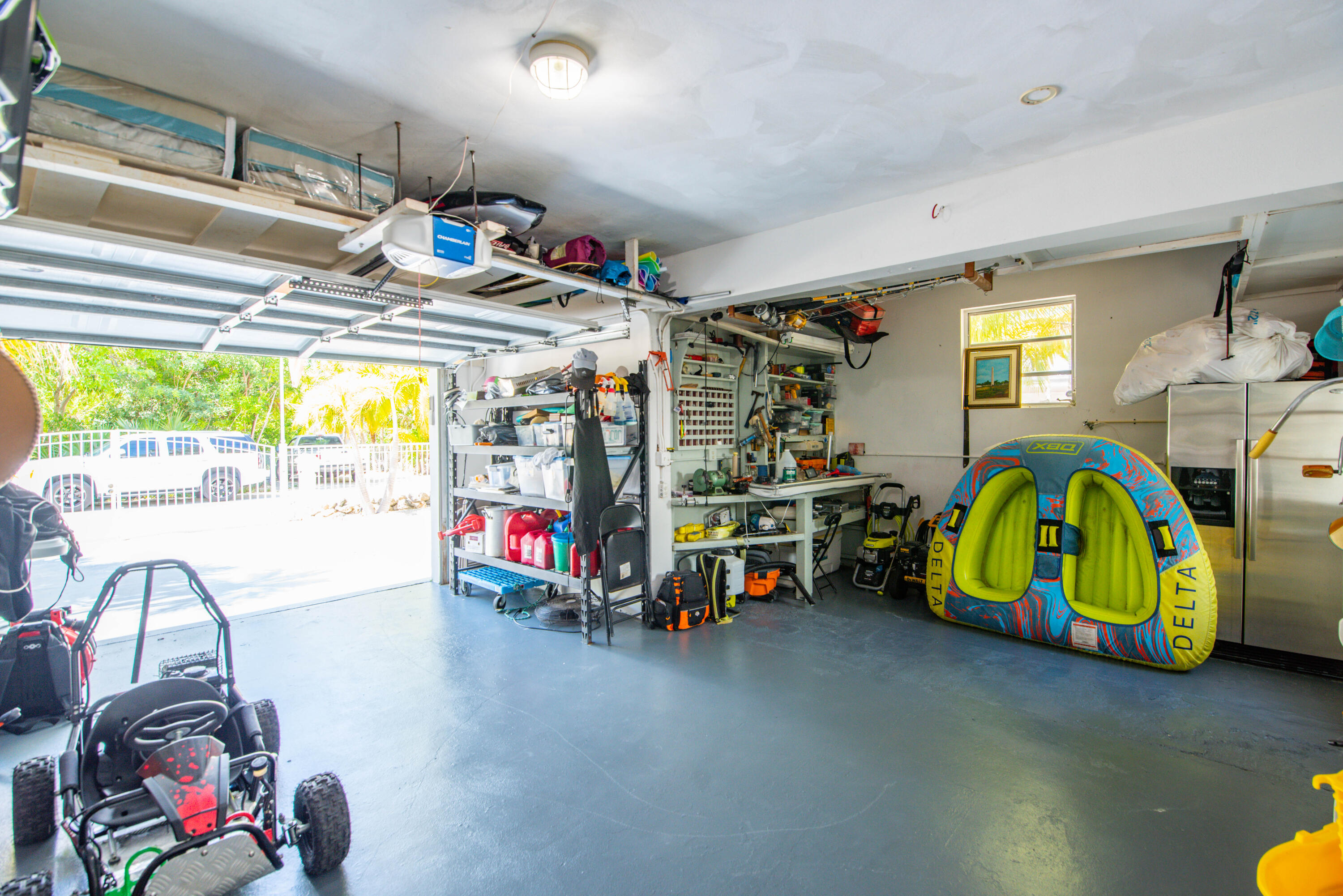 29013 Marigold Drive Big Pine Key, FL 33043 - Photo 41 of 52 a view of gym equipment with windows and air hockey table