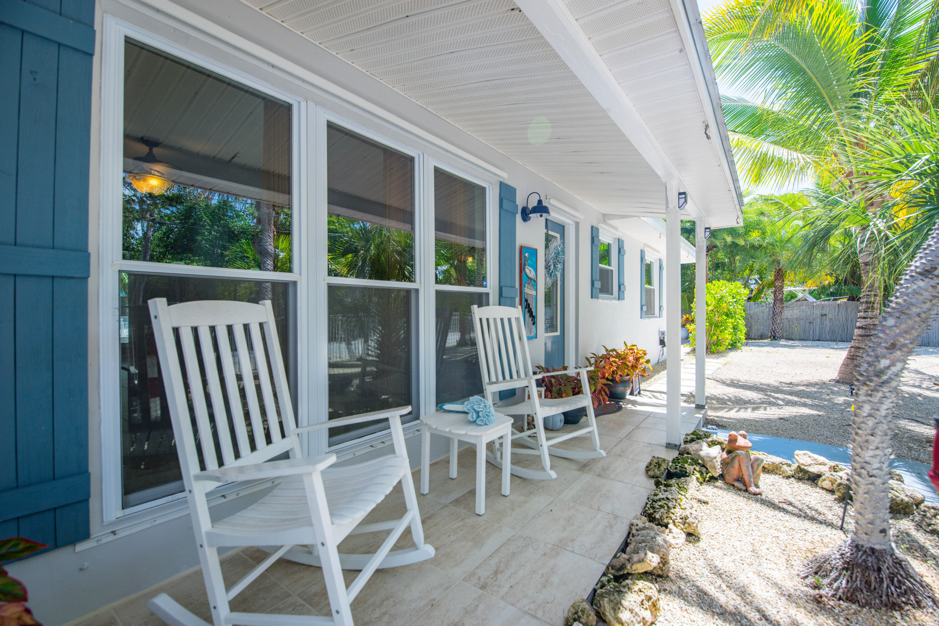 29013 Marigold Drive Big Pine Key, FL 33043 - Photo 43 of 52 a balcony with chairs and potted plants