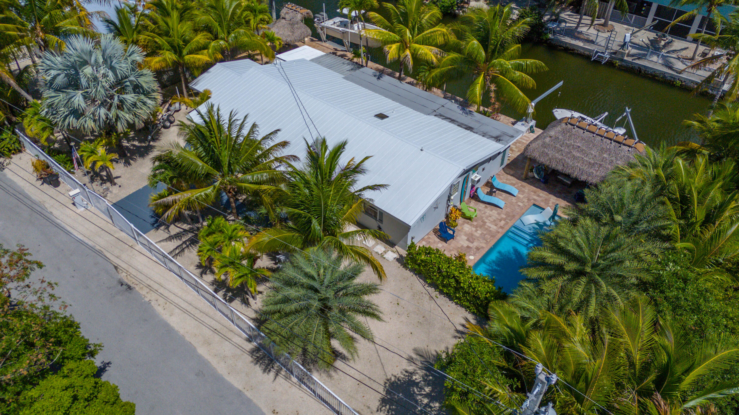 29013 Marigold Drive Big Pine Key, FL 33043 - Photo 48 of 52 an aerial view of a house with a yard and a garden