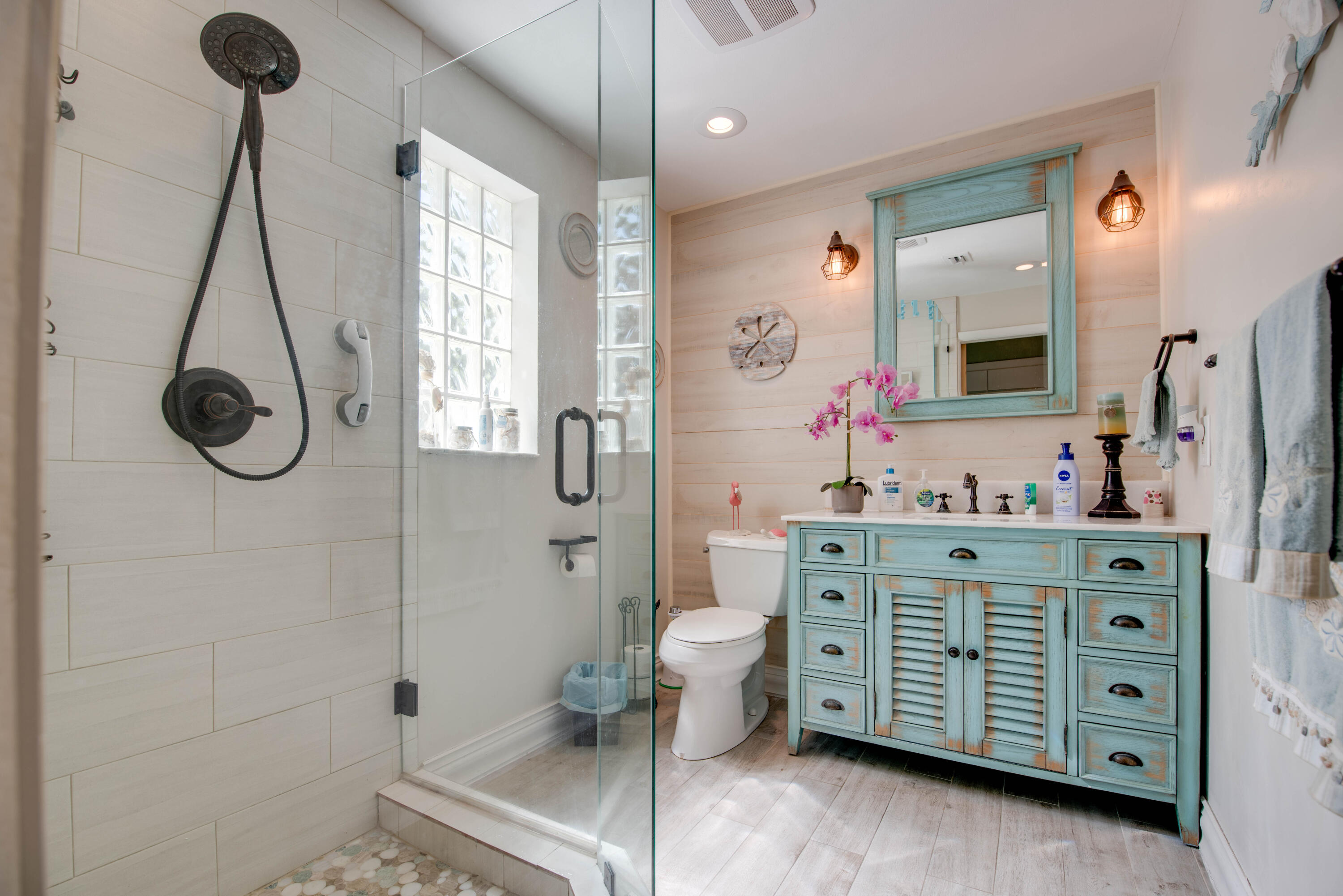 29013 Marigold Drive Big Pine Key, FL 33043 - Photo 10 of 52 a bathroom with a double vanity sink toilet and shower