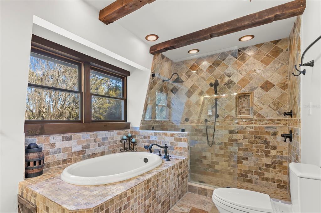 809 Cardinal Avenue Palm Harbor, FL 34683 - Photo 29 of 66 a bathroom with a sink a toilet and shower